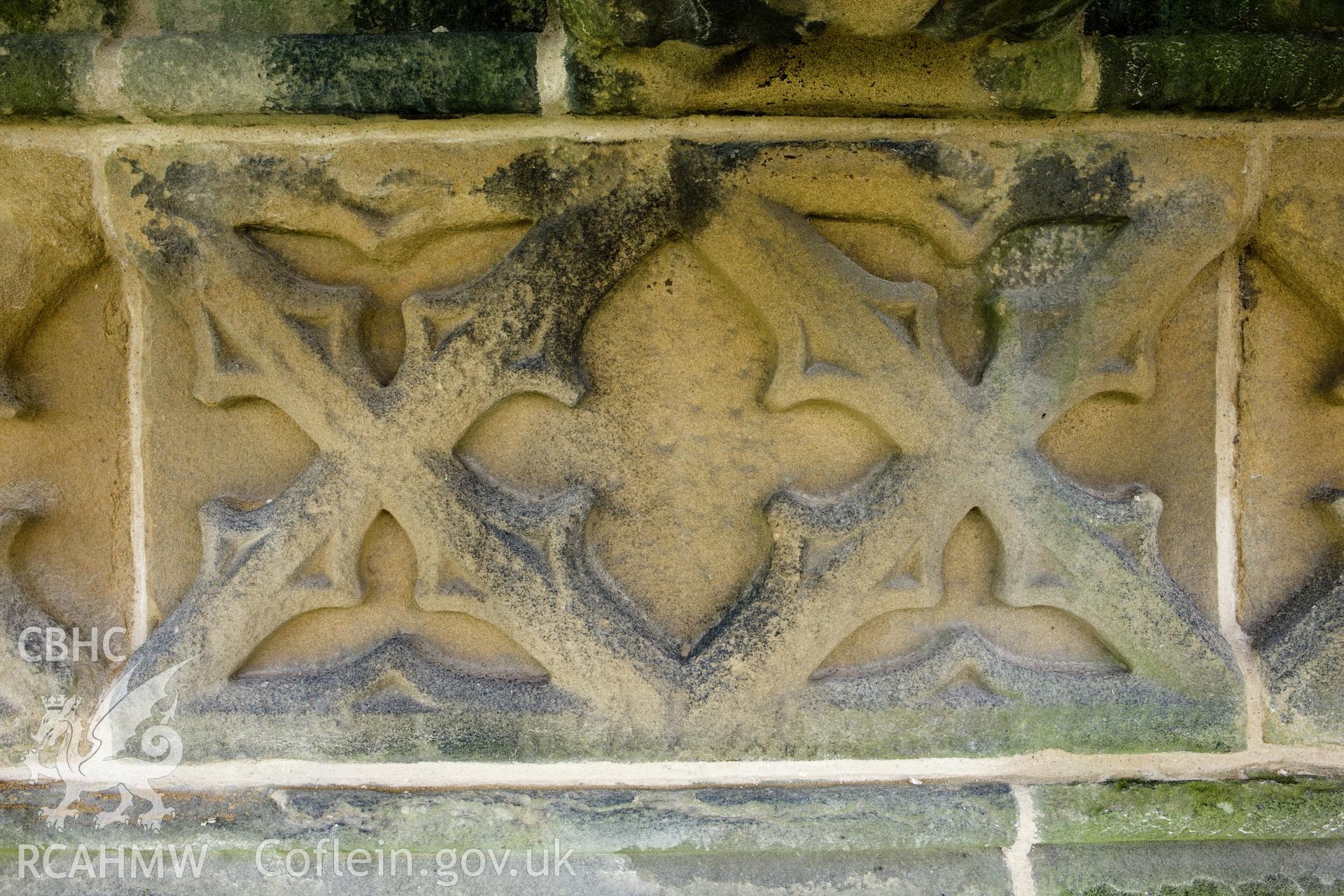 Stone carving below finials, moving clockwise.