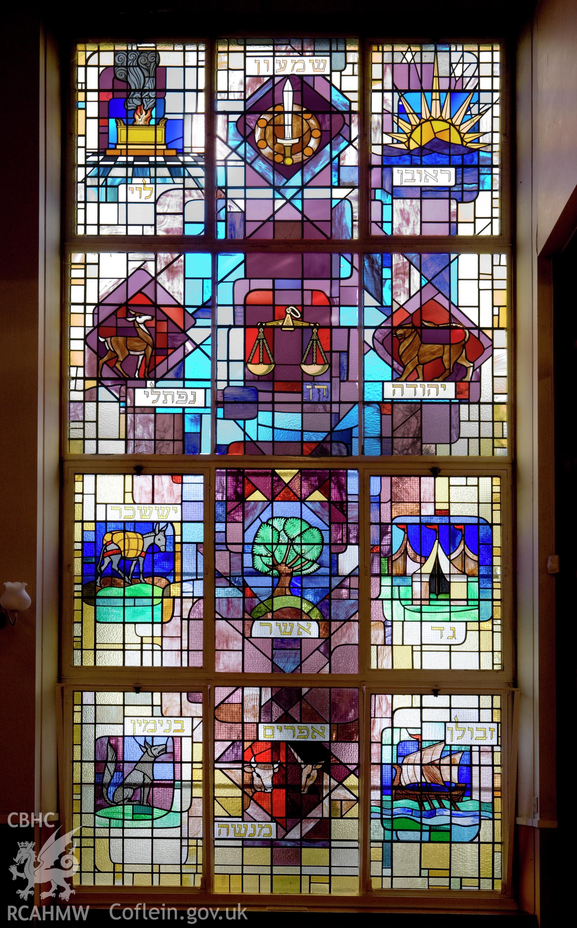 Stained glass window in south wall.
