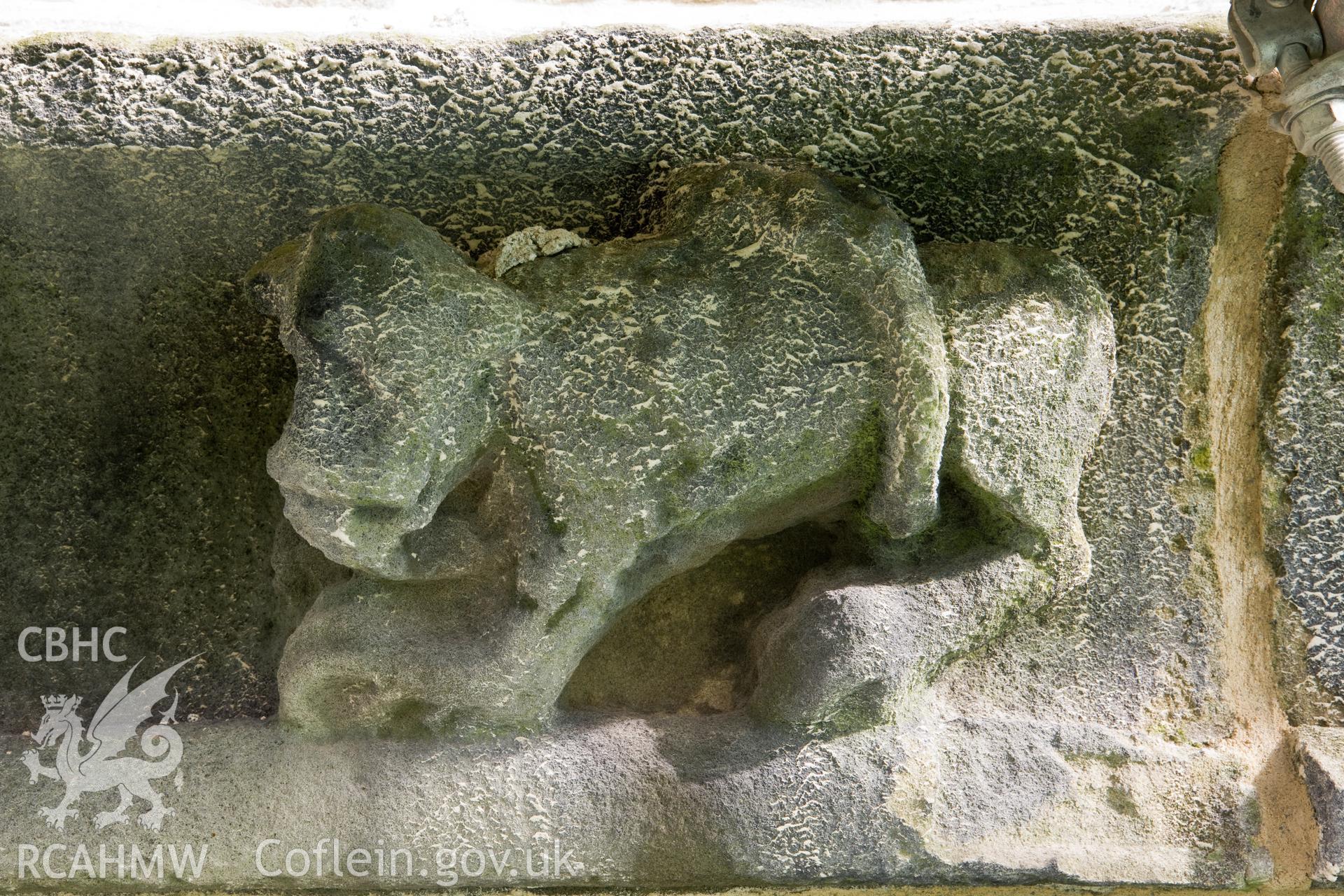 Stone carving below finials, moving clockwise.