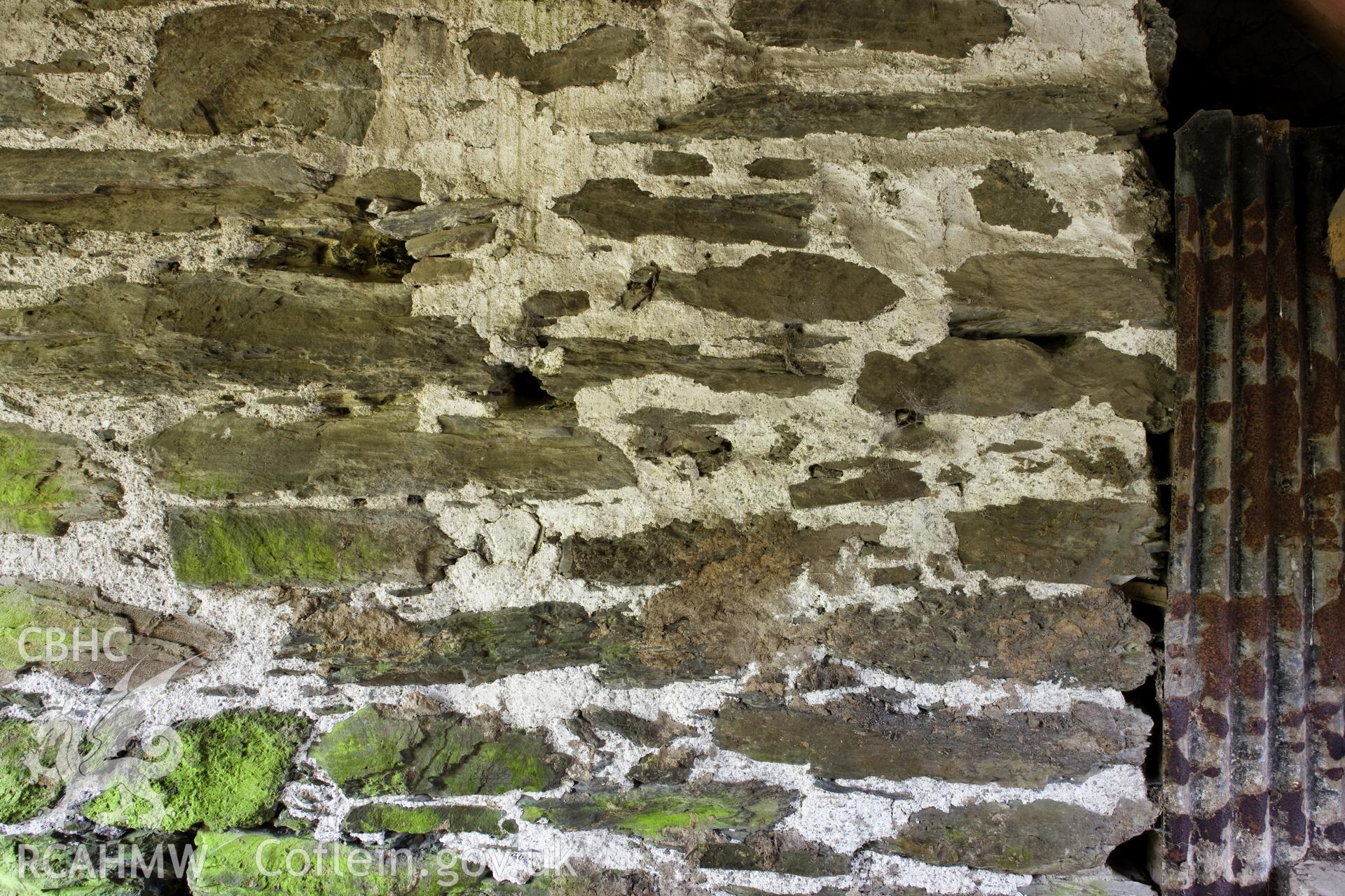 Pointing detail on exterior of fireplace wall.