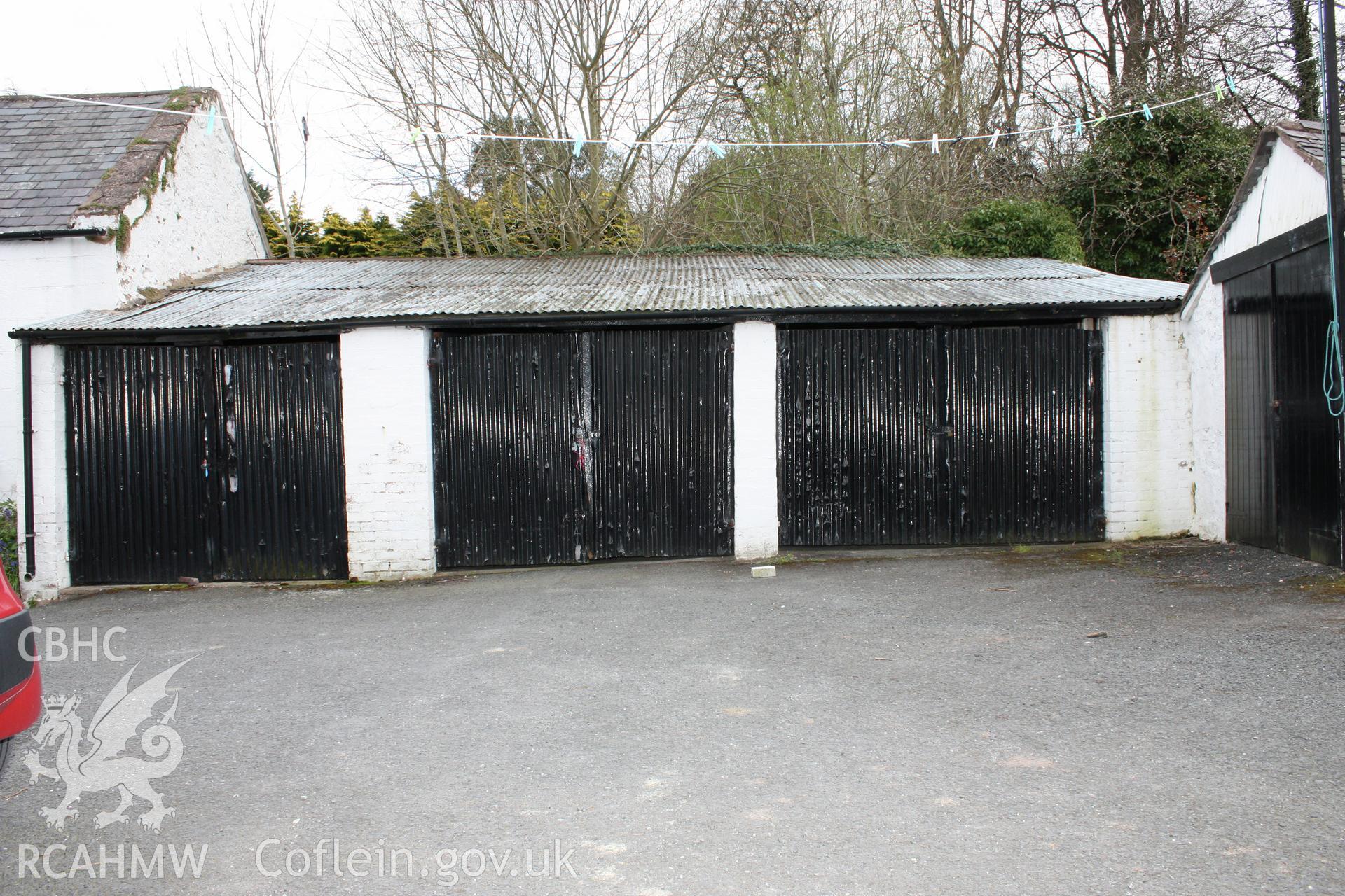 Lean to garages, west elevation in rear projecting wing.