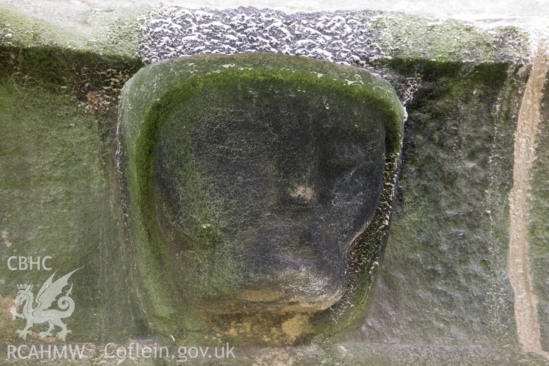 Stone carving below finials, moving clockwise.