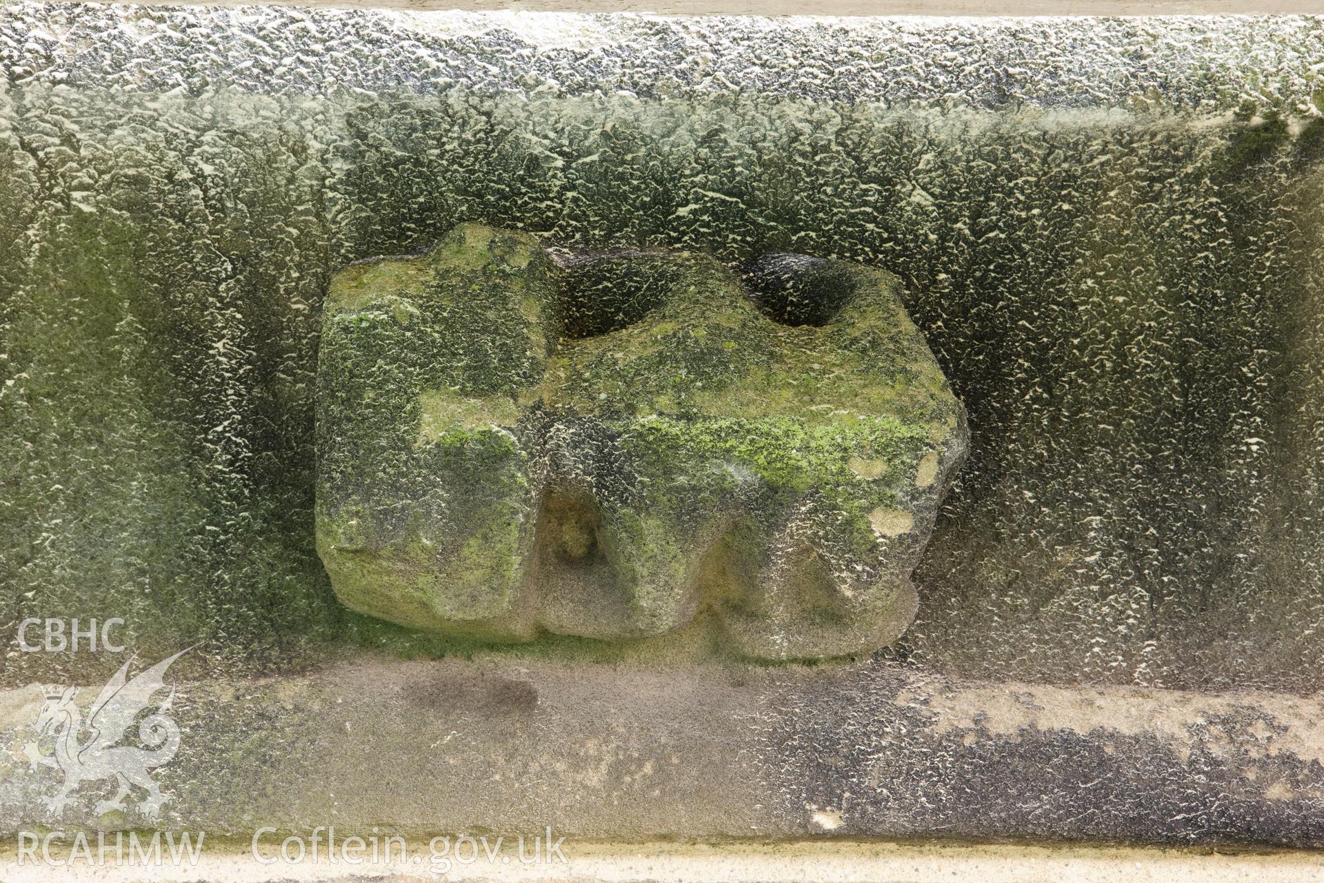 Stone carving below finials, moving clockwise.