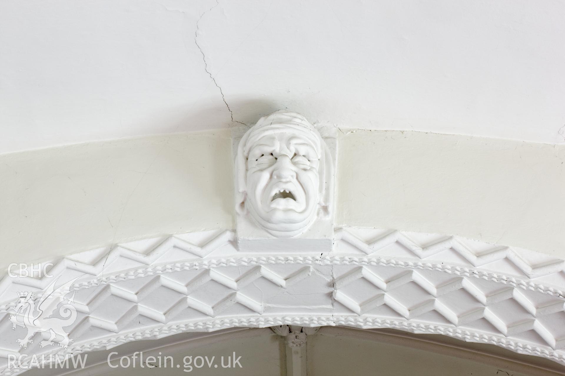 Grotesque on chancel arch.
