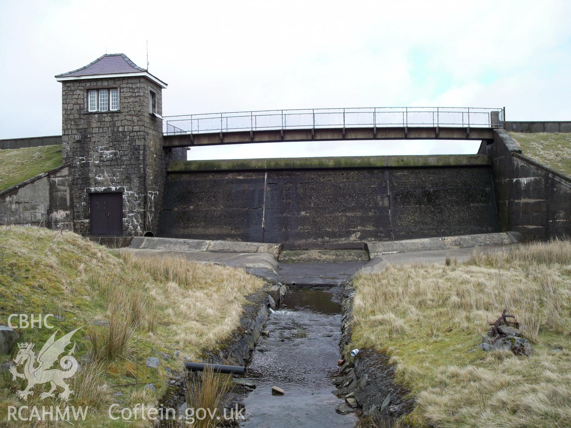 Detail of dam, outlet channel and regulation tower/valve house; taken from the south.