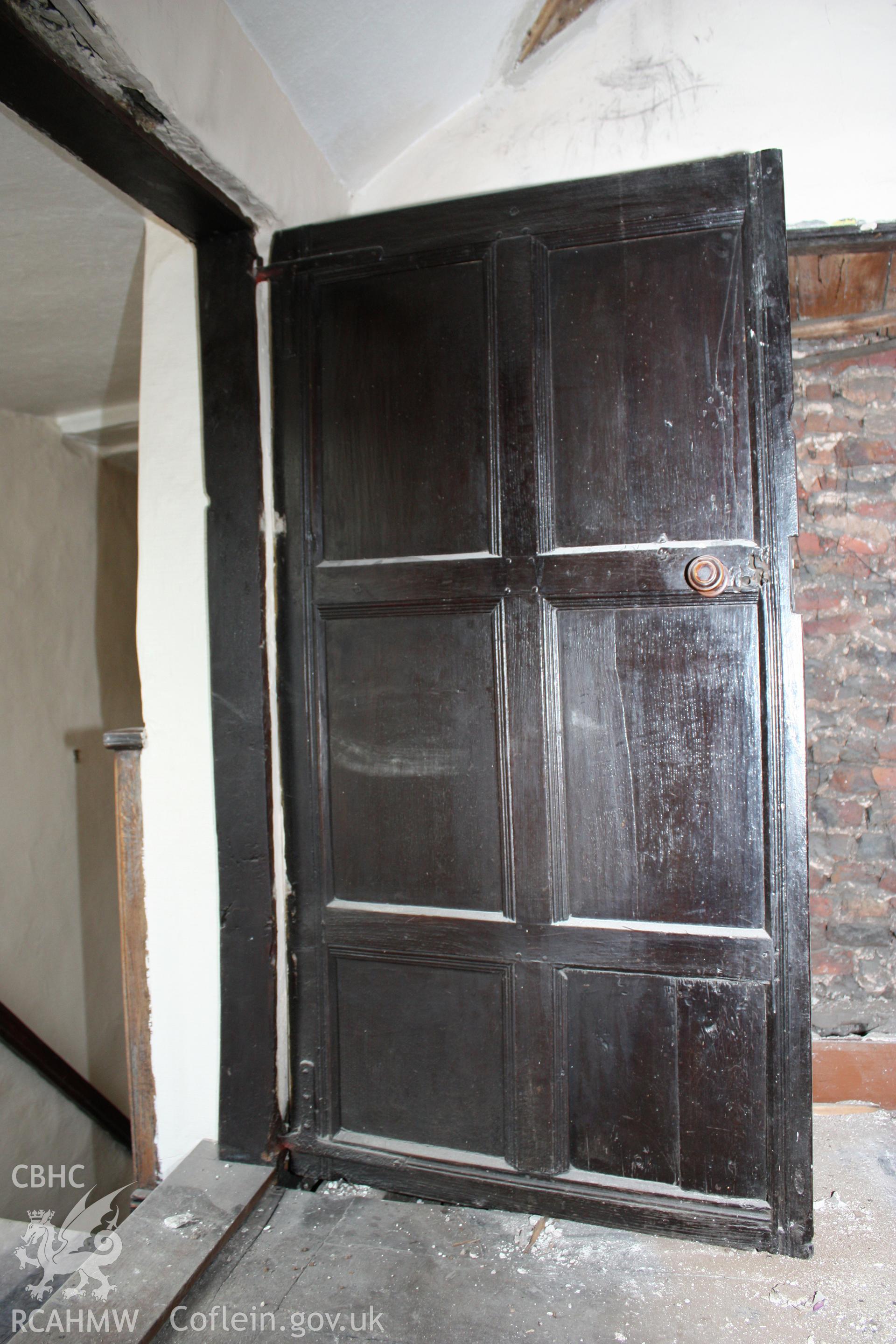 51, Clwyd Street, 3-unit 17th century range, first-floor rear south wall, doorway.