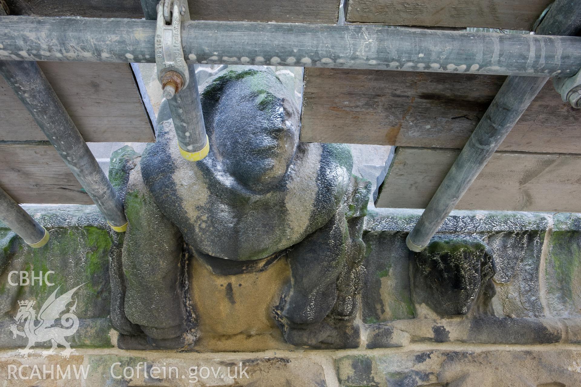 Stone carving below finials, moving clockwise.