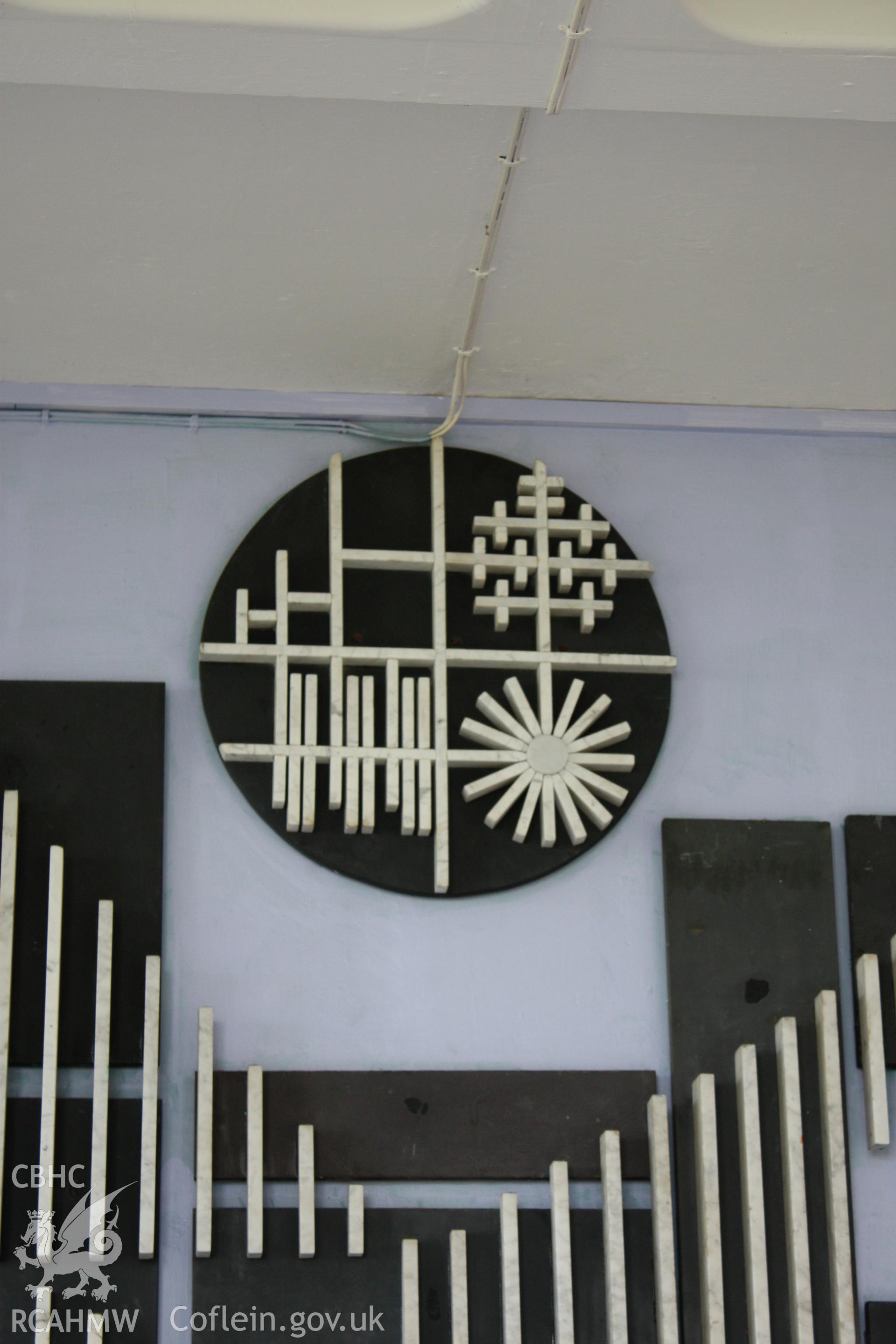 The Bridge - Detail of panel 3 including representation of agricultre and the inclusion of H motifs representng the college.
