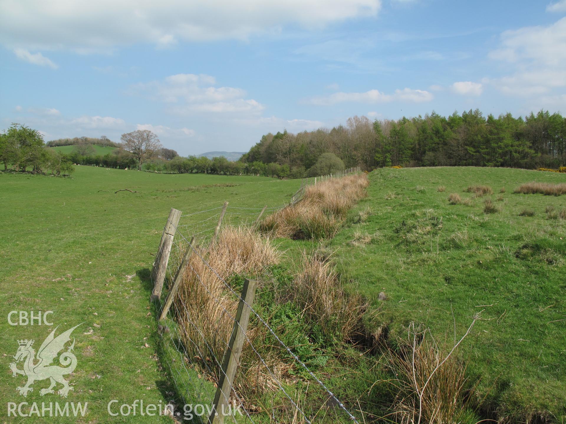 View along leat from reservoir supplying water turbine (nprn 408949) looking east.