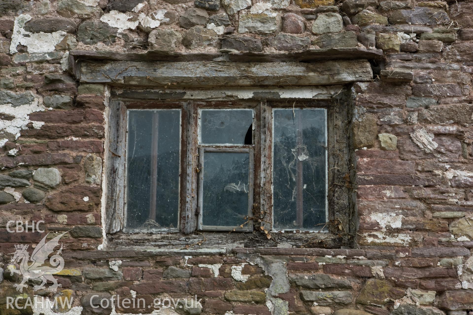 Window in stair tower.