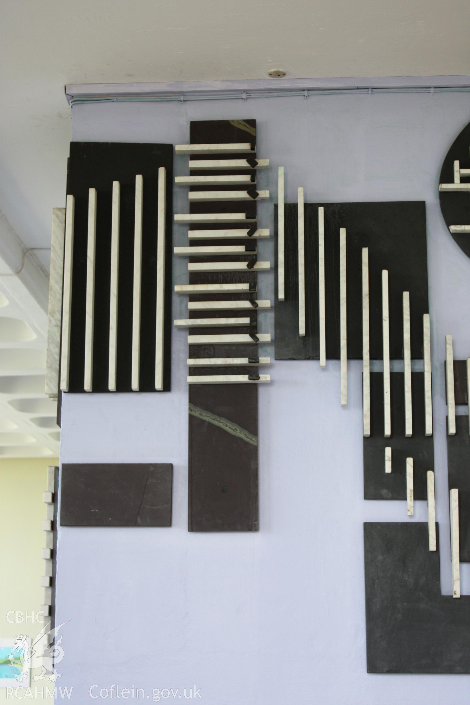The Bridge - Detail of panel 3 including representation of the musical keyboard/internal combustion engine.
