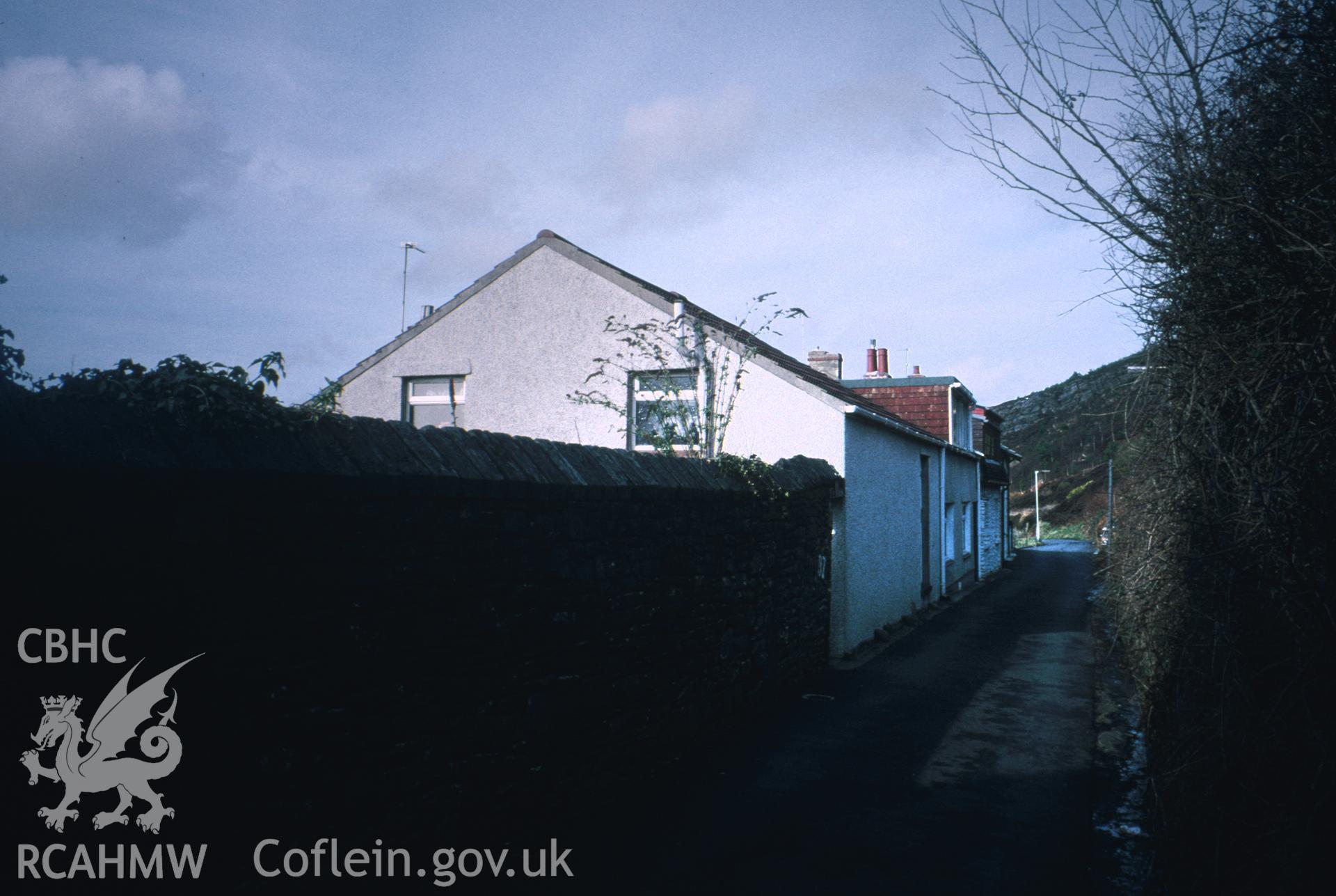 Colour slide of All Saints, Kilvey Road, Swansea: showing copper-slag coping, and the Infants School to the north.