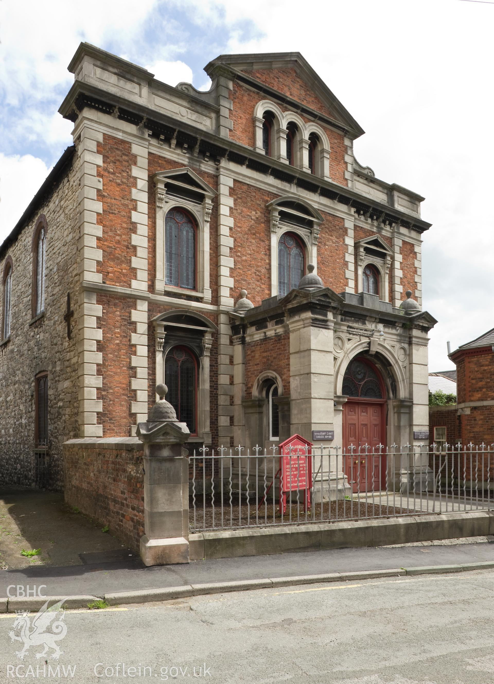Oblique view of main facade.
