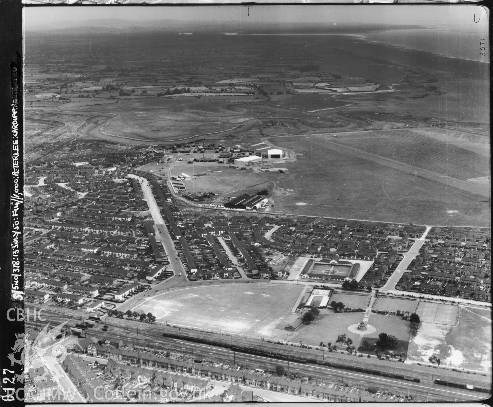 Black and white low level oblique aerial photograph taken by the RAF July 1950 centred on Splott Park.