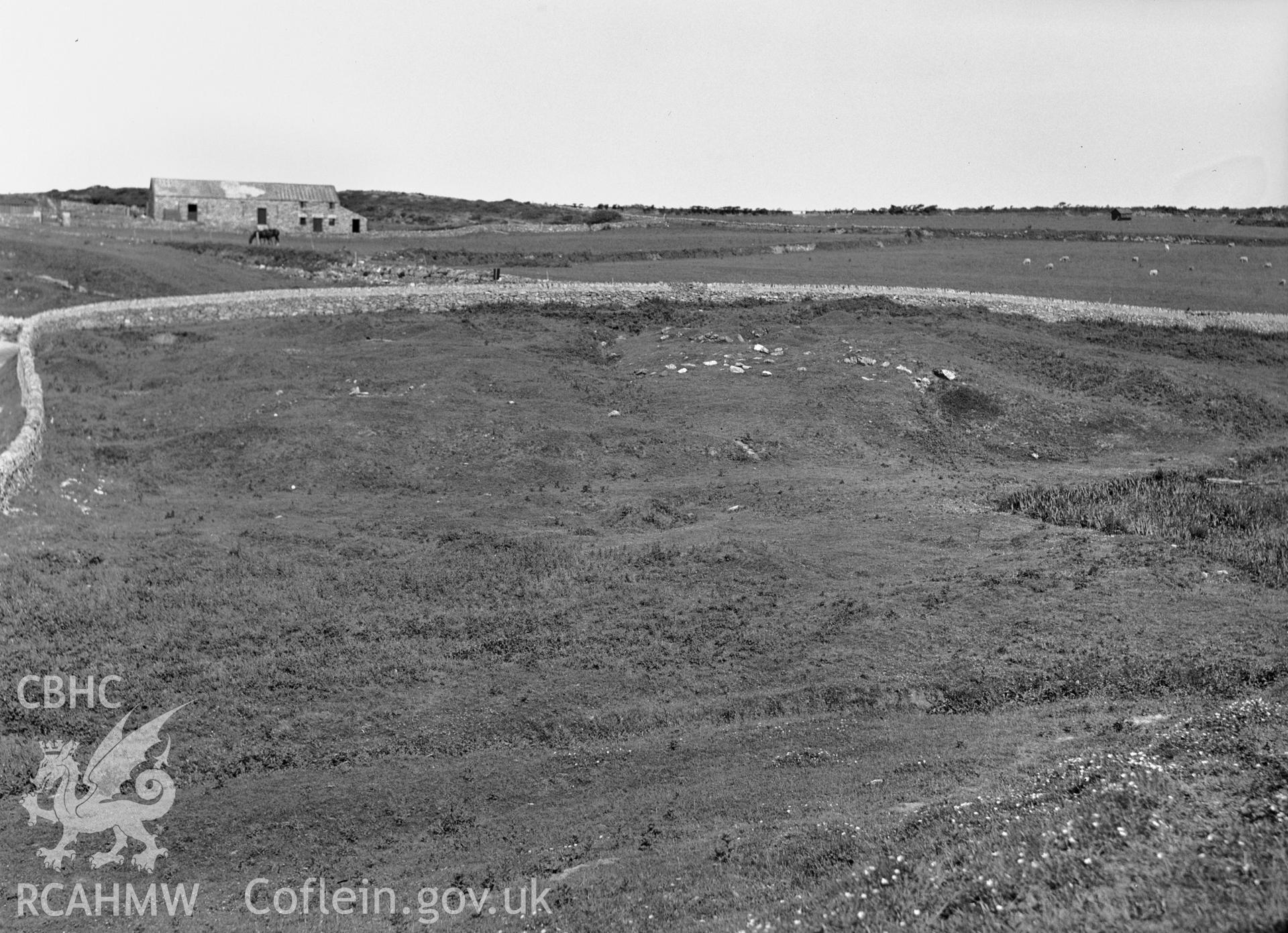 One black and white photograph showing hut group at Porth Dafarch, taken by RCAHMW before 1960