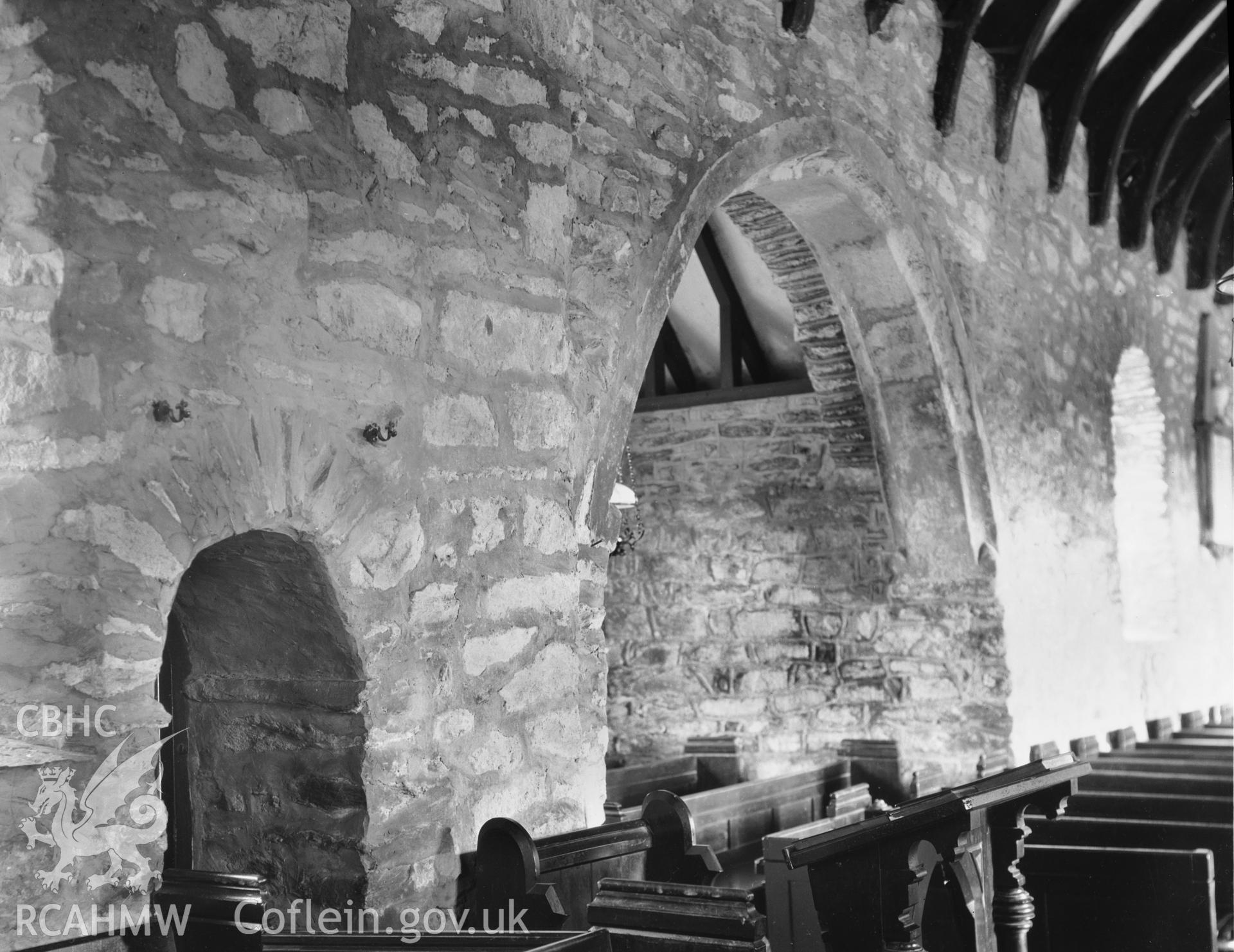 Interior showing arch to South Transept and chancel South door