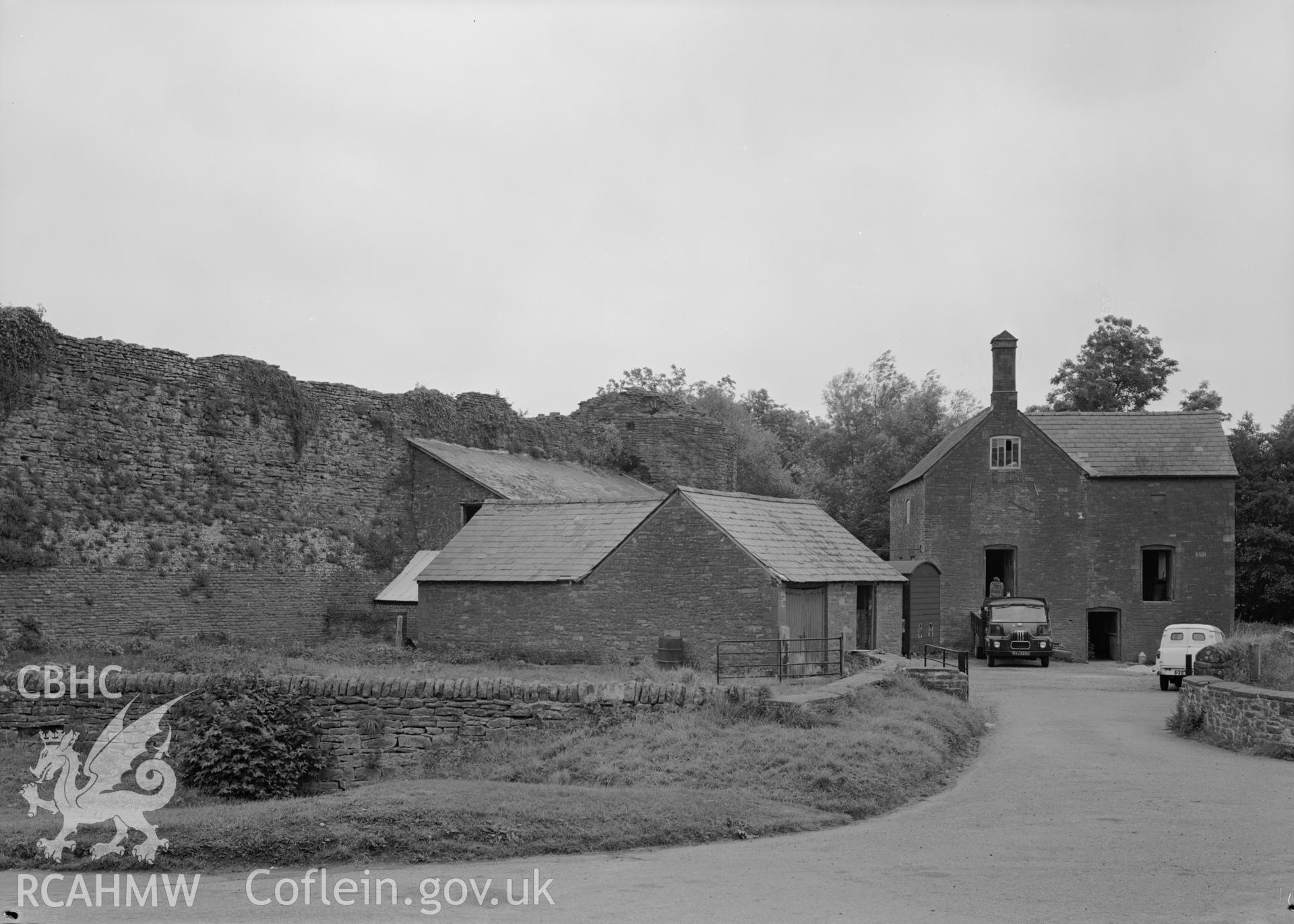 D.O.E photograph of Skenfrith Castle Mill and curtain wall.