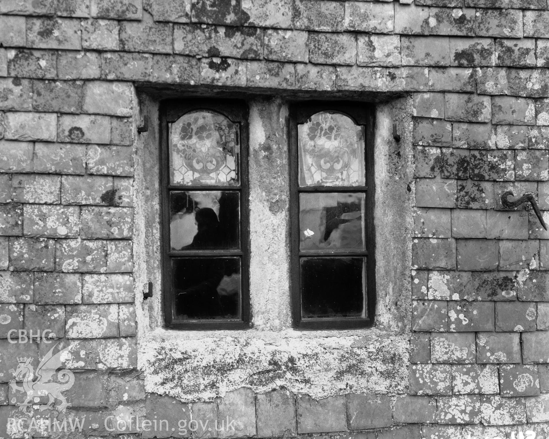 Digitised copy of a black and white negative showing window at Llantrisant Old Church produced by RCAHMW before 1960.