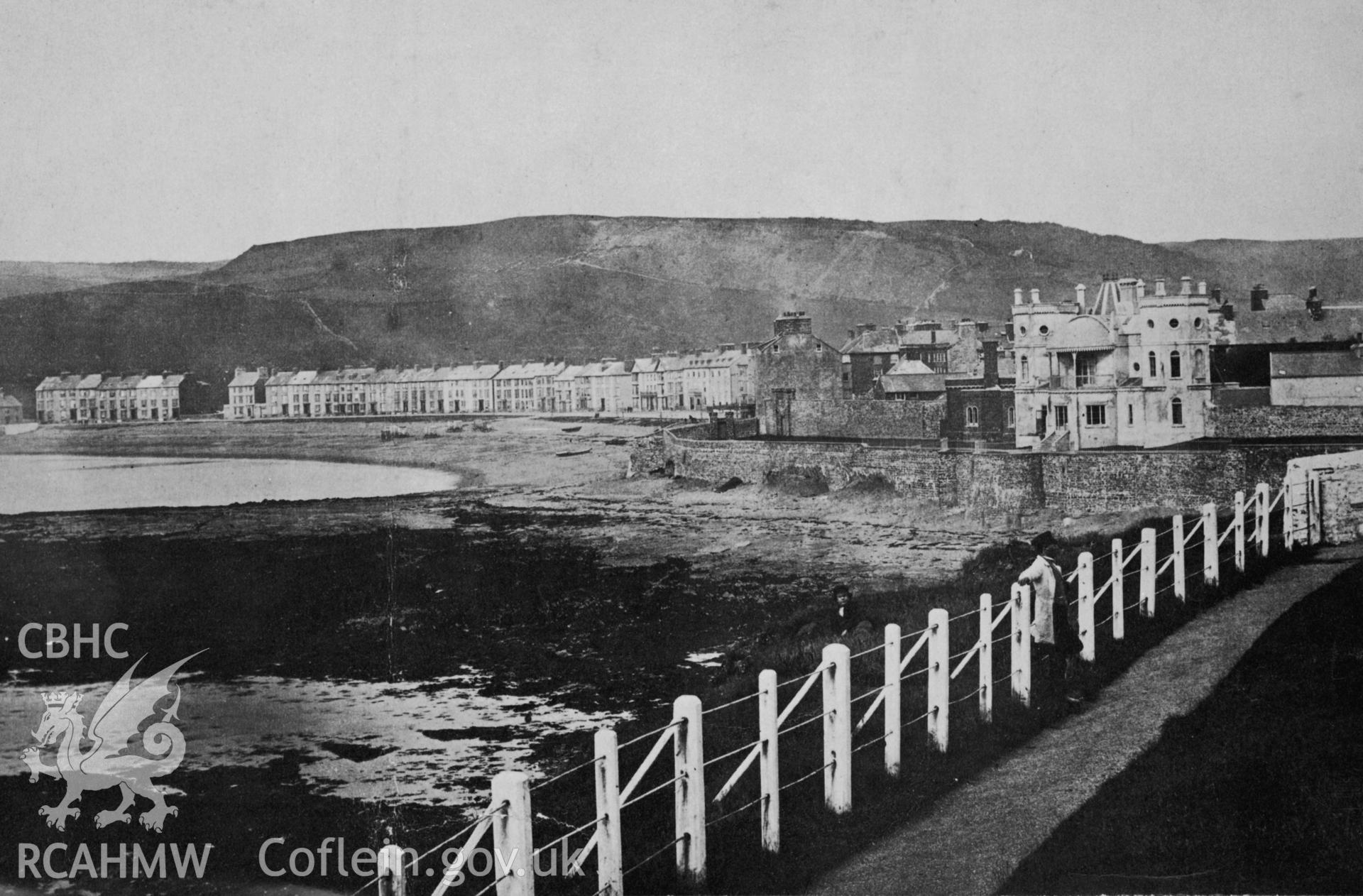 A black and white print view of Castle House before the building of the pier and the Old College, Aberystwyth. Print comes from "Aberystwyth Yesterday".