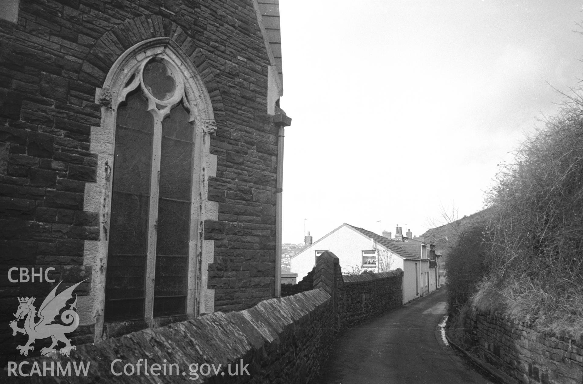 Photograph of All Saints Church, Kilvey Road, Swansea: showing the east end of the church, with the former Kilvey Infants School to the north.