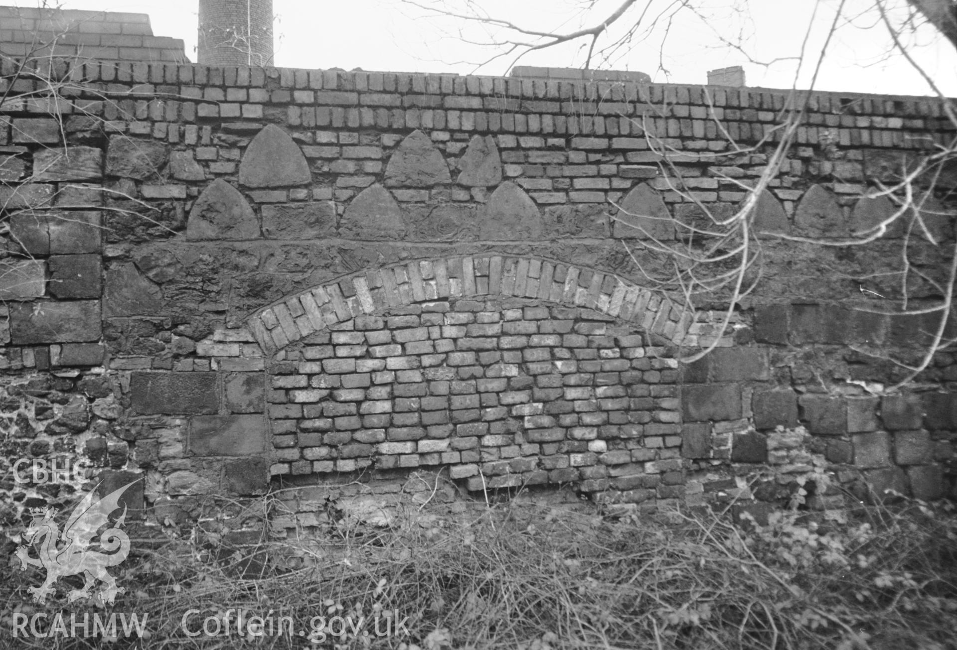 Photograph of Hafod Copperworks, Swansea: showing the work's wall and moulded slag blocks.