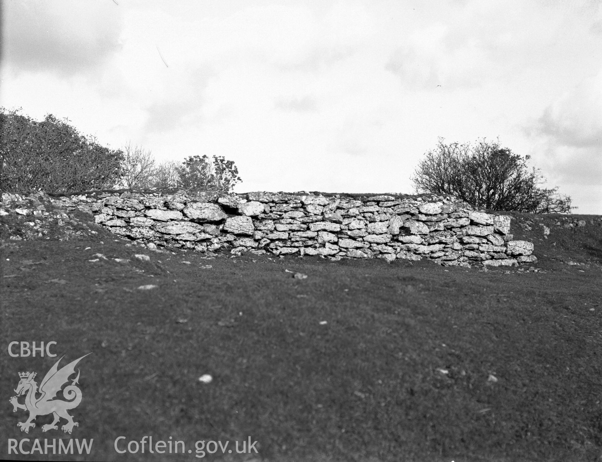Digitised copy of a black and white negative showing Parciau Hillfort produced by RCAHMW, pre1960.
