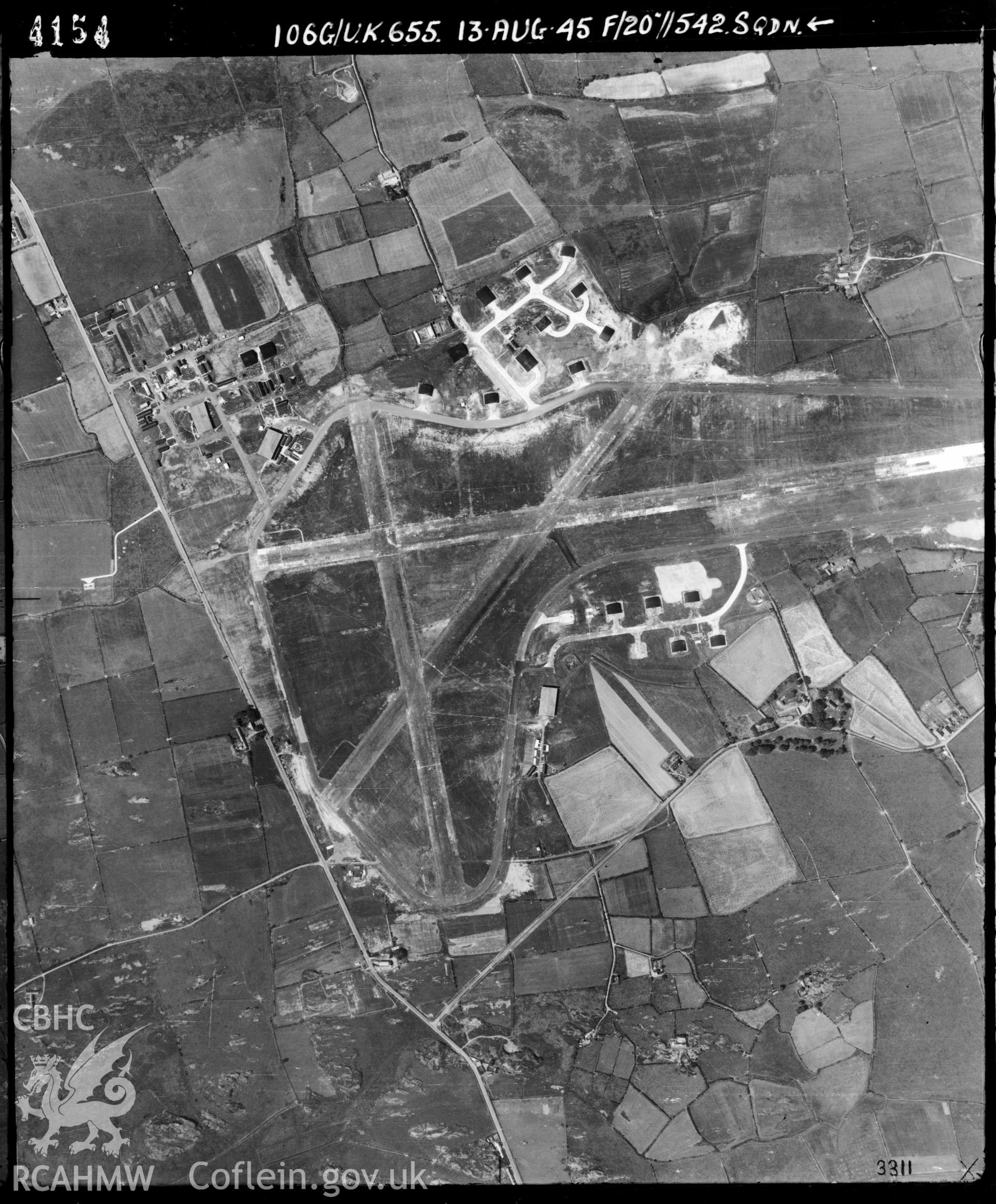 Black and white vertical aerial photograph taken by the RAF on 13/08/1945 centred on SH42957741 at a scale of 1:10000. The photograph includes part of Llanddyfnan community on the Isle of Anglesey.