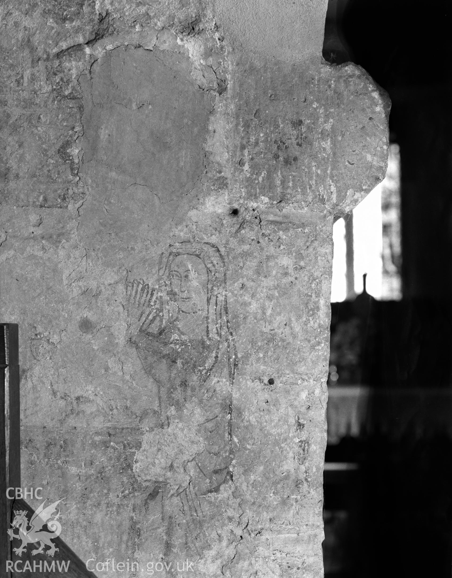 Interior view showing painting on the wall of the chancel arch.