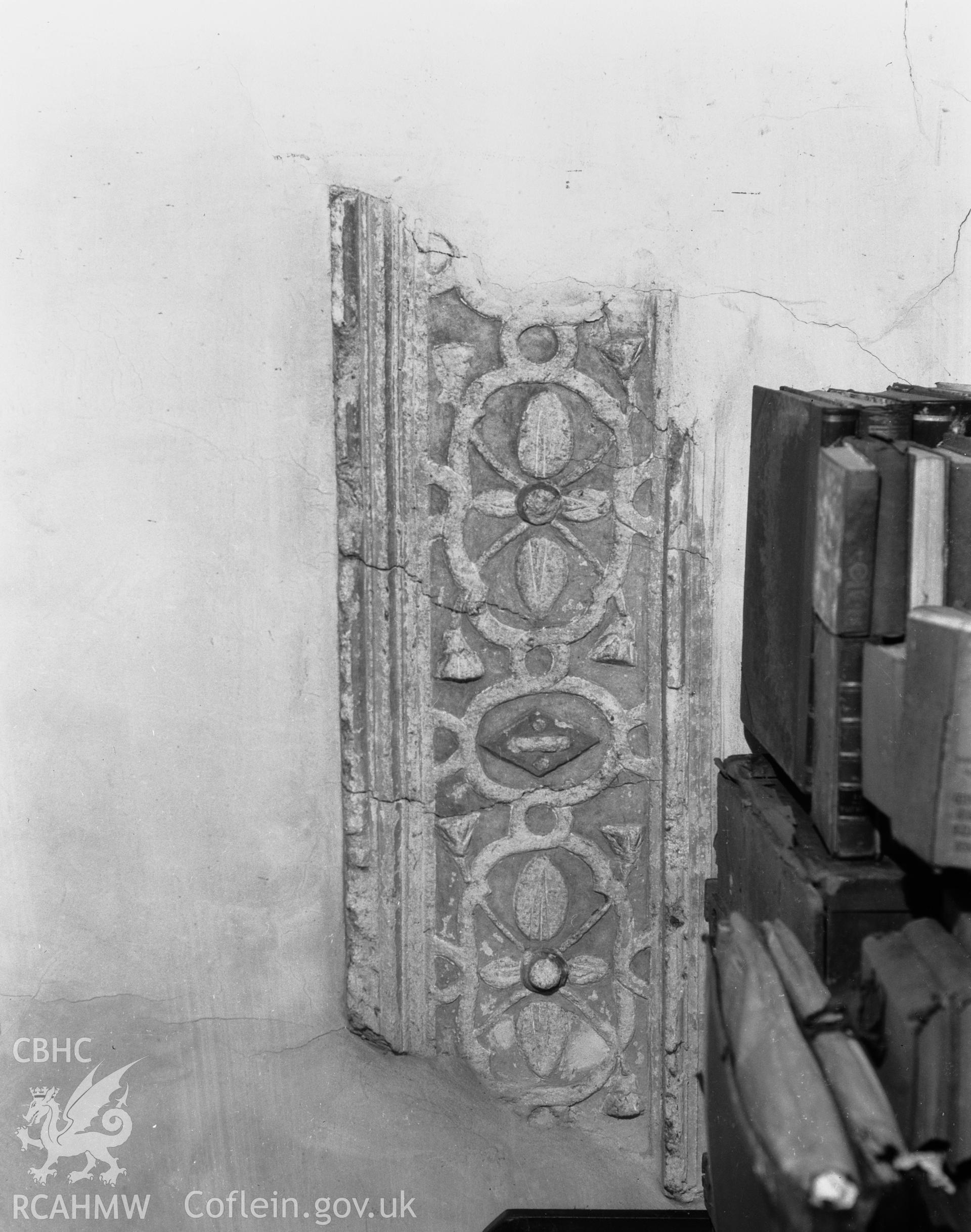 Portion of plaster frieze in W block