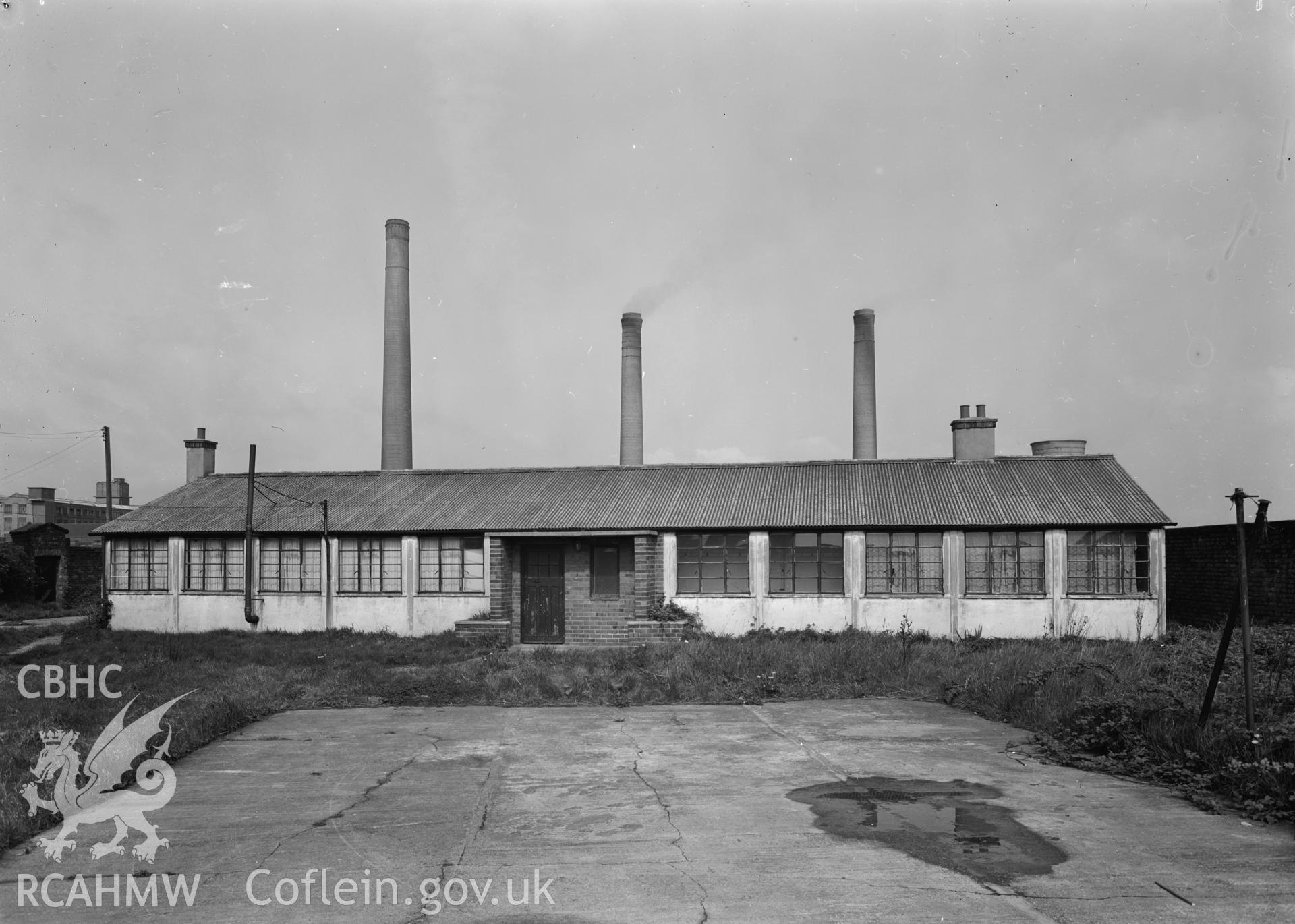 D.O.E photograph of Flint Gaol - army cadets hut from south east. In castle outer ward (since removed).