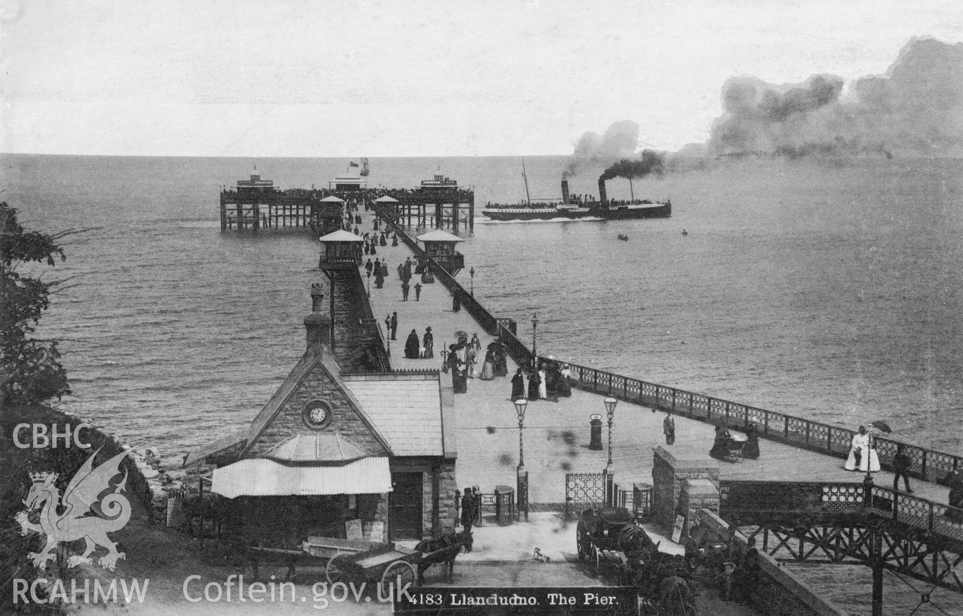 Digital copy of a photograph of Llandudno Pier with a steamship in view , date and origin unknown