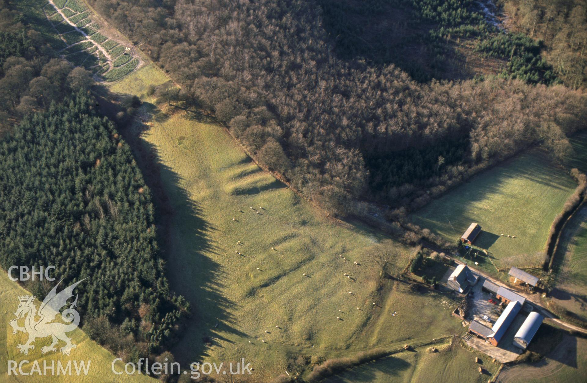 RCAHMW colour slide aerial photograph of Cowthers Coppice , settlement Earthworks. Taken by C R Musson on 02/01/1995