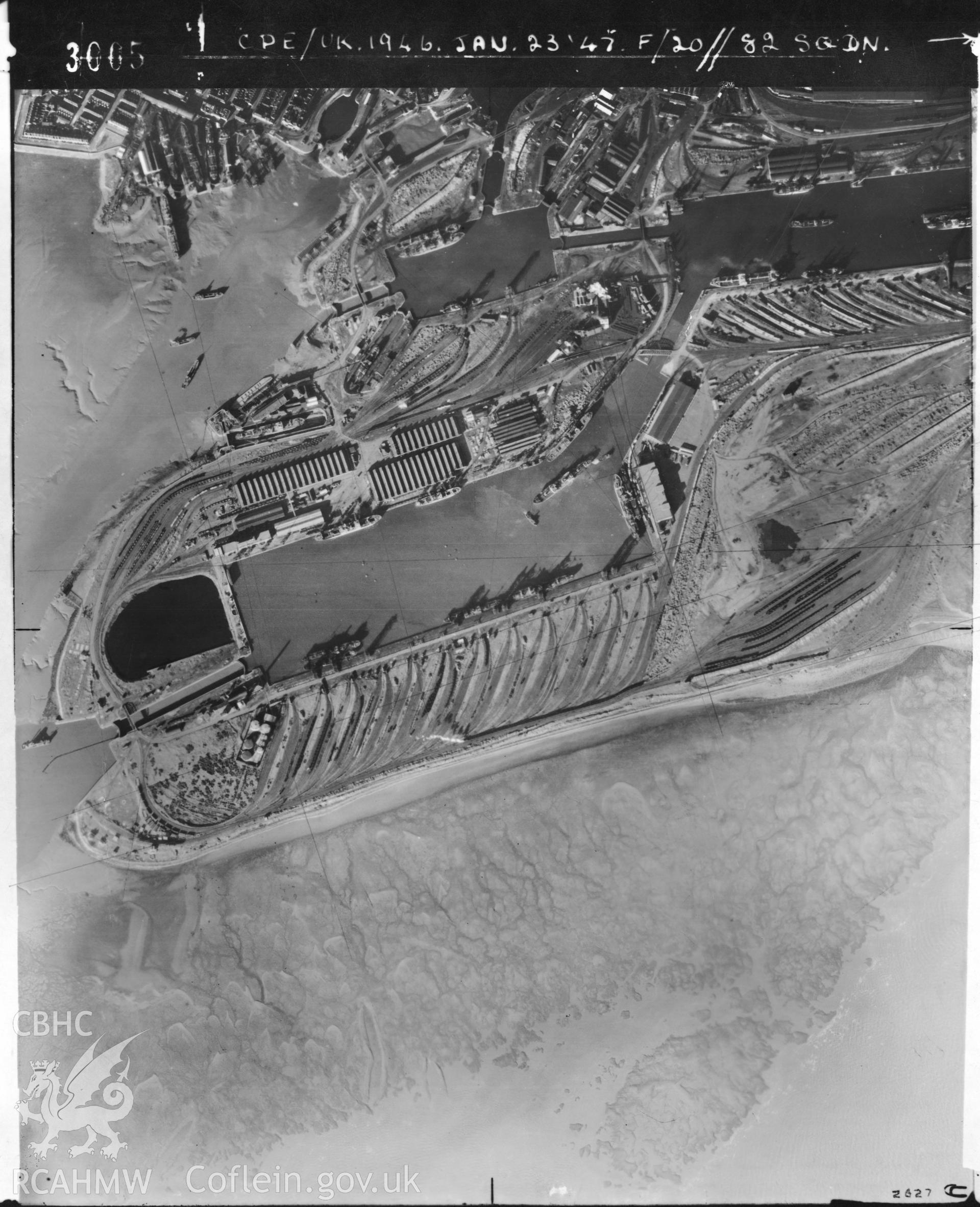 Black and white vertical aerial photograph taken by the RAF on 23/01/1947 centred on ST19957417 at a scale of 1:10000. The photograph includes part of Butetown community in Cardiff.