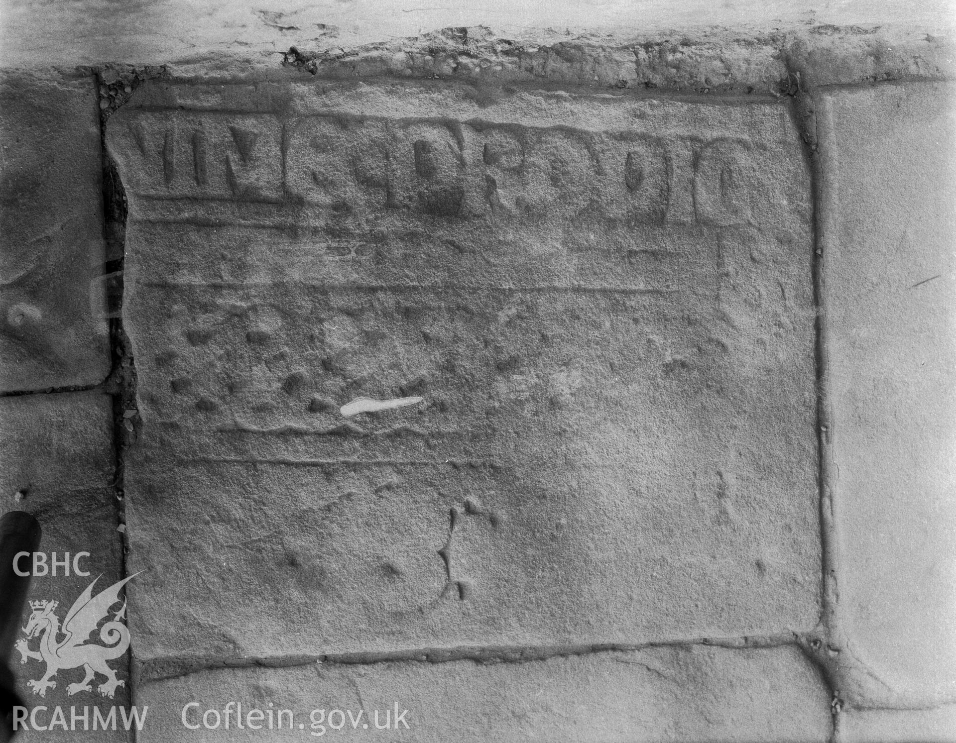 Inscribed floor slab in porch