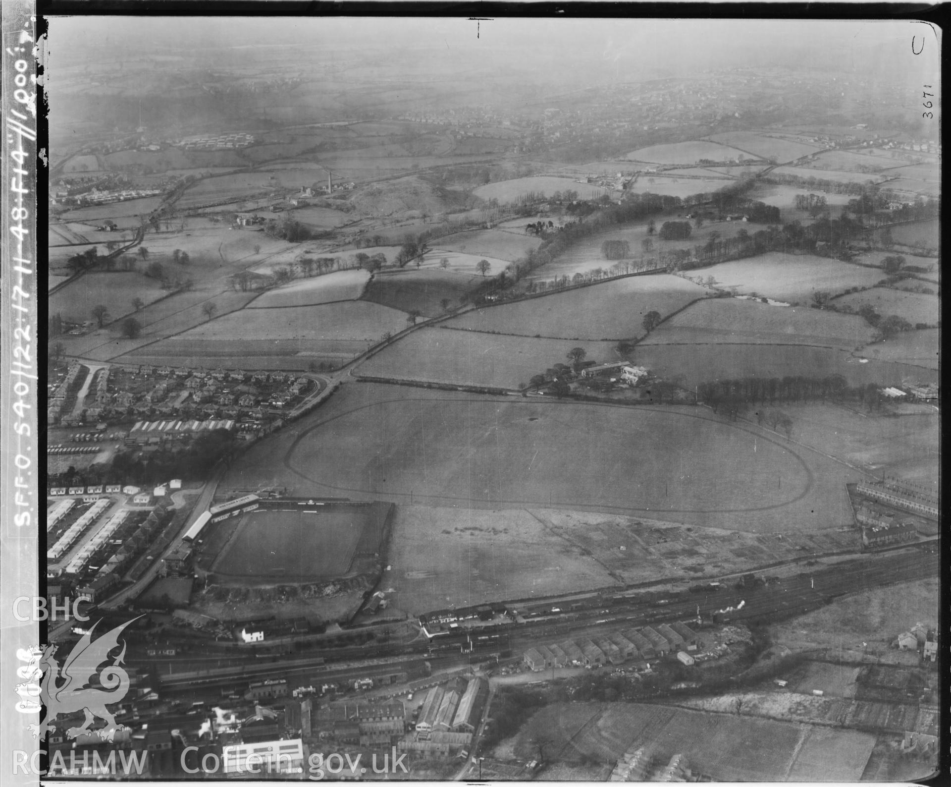 Black and white vertical aerial photograph taken by the RAF on 17/11/1948 showing the Racecourse at Wrexham.