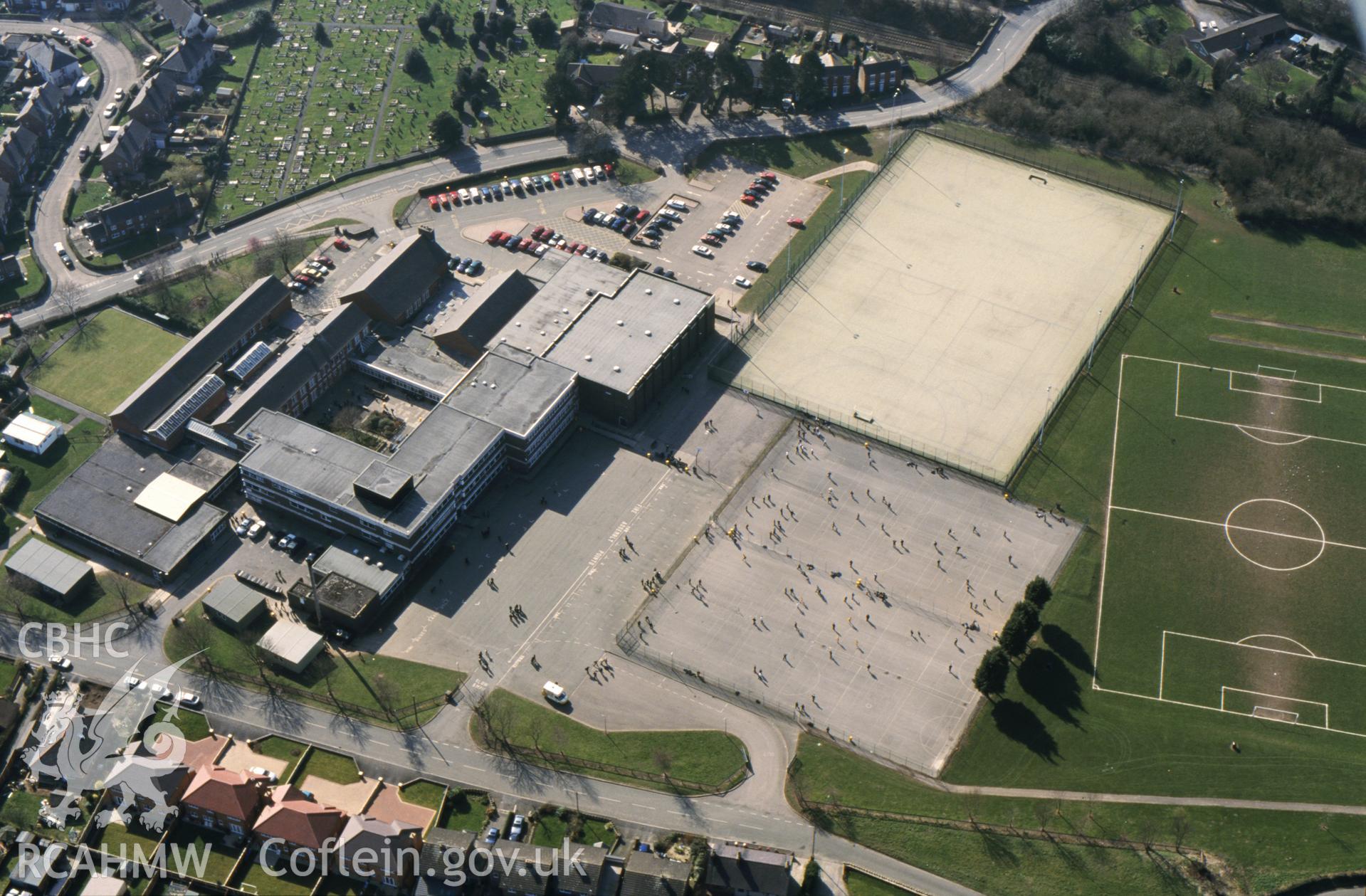 RCAHMW colour oblique aerial photograph of Castell Alun High School. Taken by Toby Driver on 14/03/2003