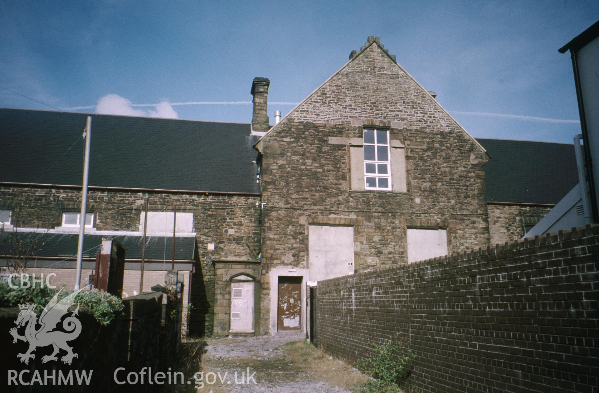 Colour slide of Hafod Copperworks School: showing the south-east central gable to the former playground from the south-east.