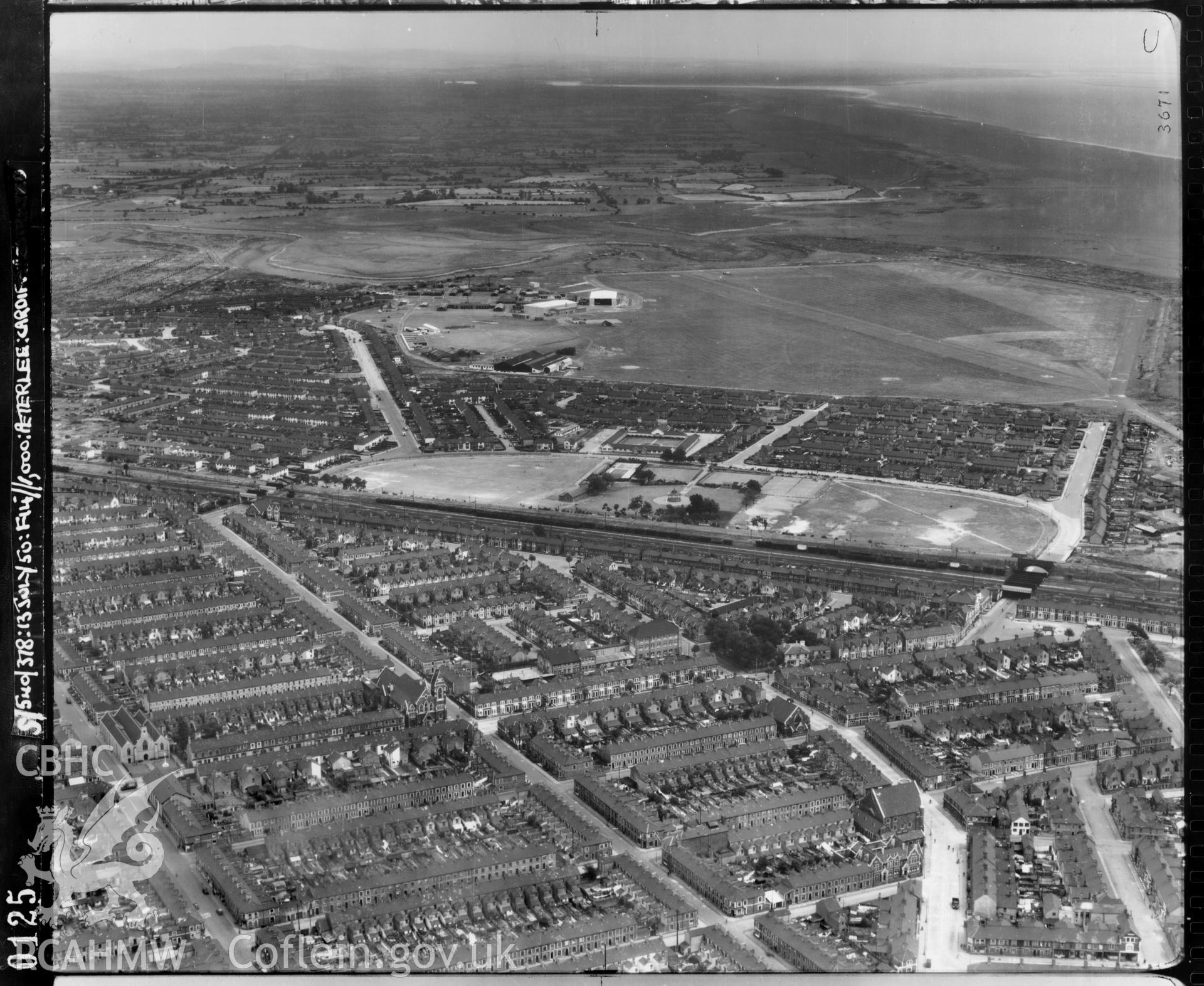Black and white low level oblique aerial photograph taken by the RAF 1950 centred on Splott Park.