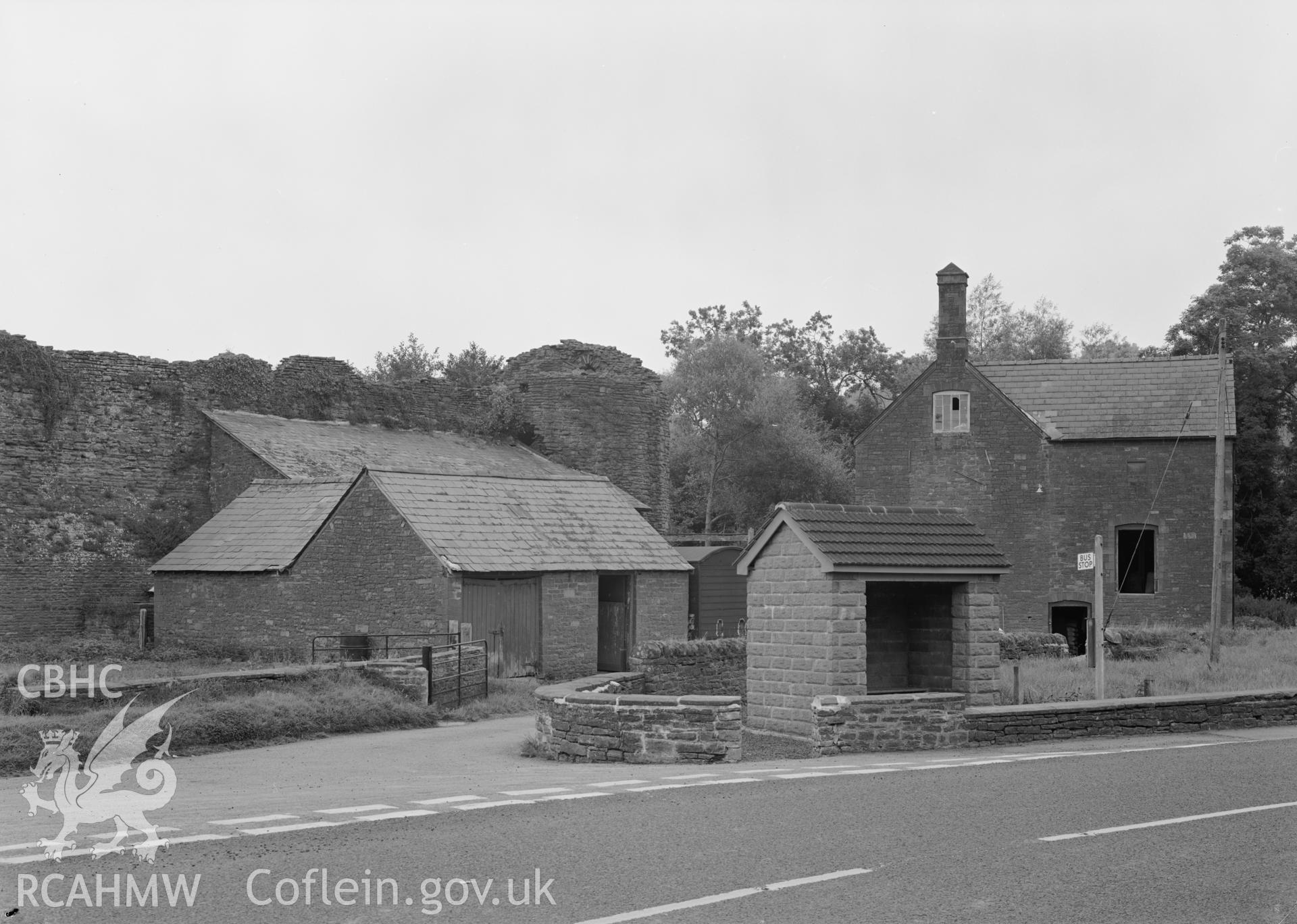D.O.E photograph of Skenfrith Castle Mill and bus stop.