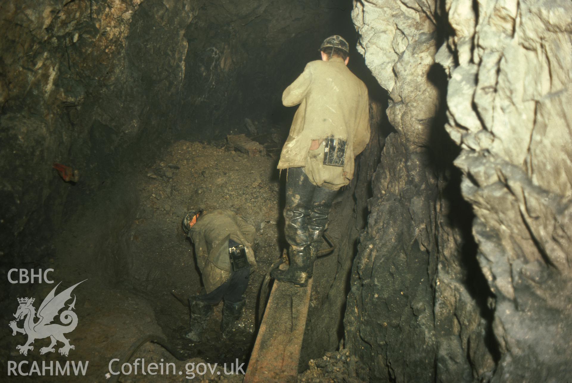 Digitized 35mm slide of Milwr Tunnel, Halkyn, showing men working in Lode 621.