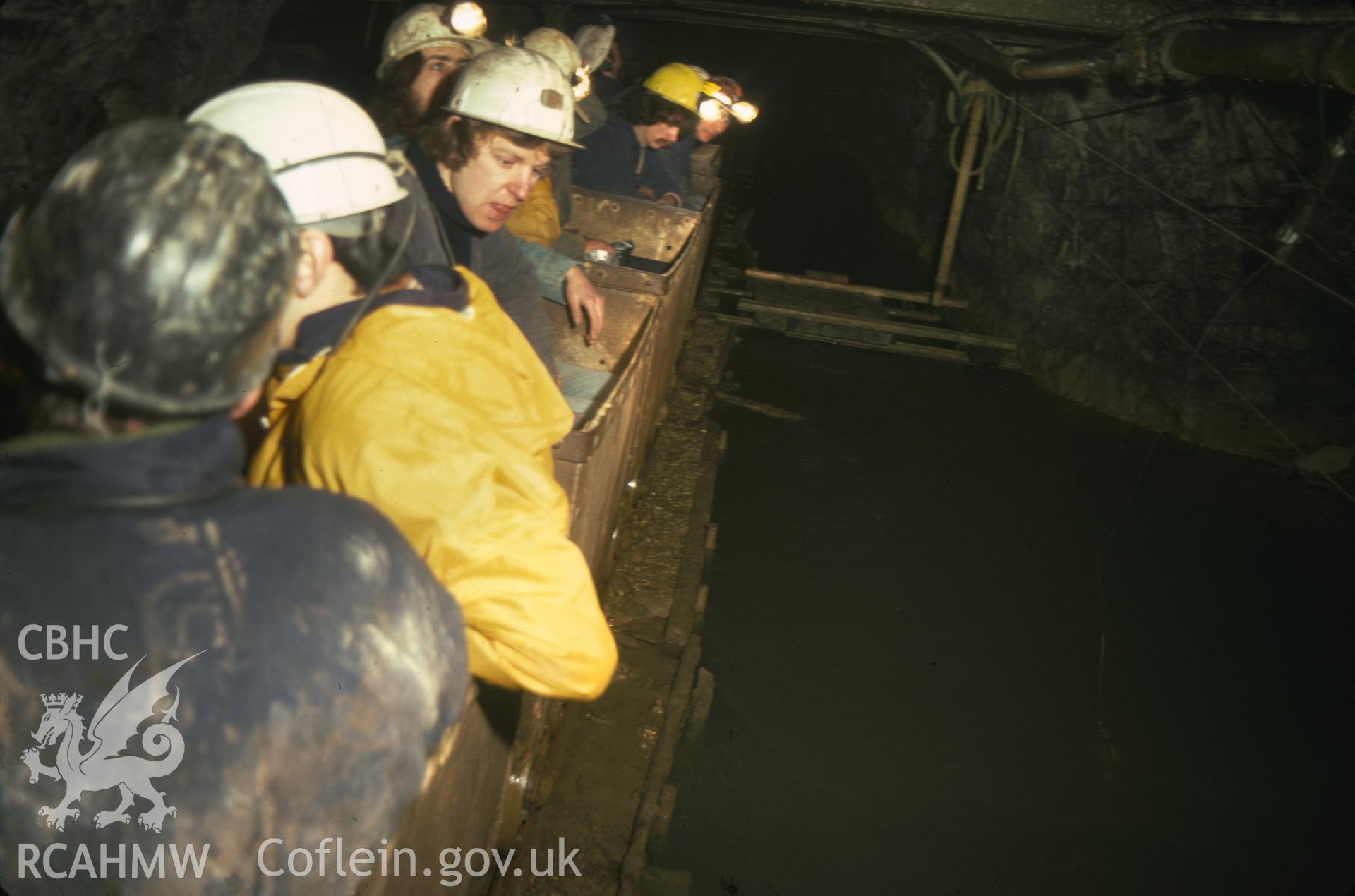 Digitized 35mm slide of Milwr Tunnel, Halkyn, showing a visiting party riding in a train.