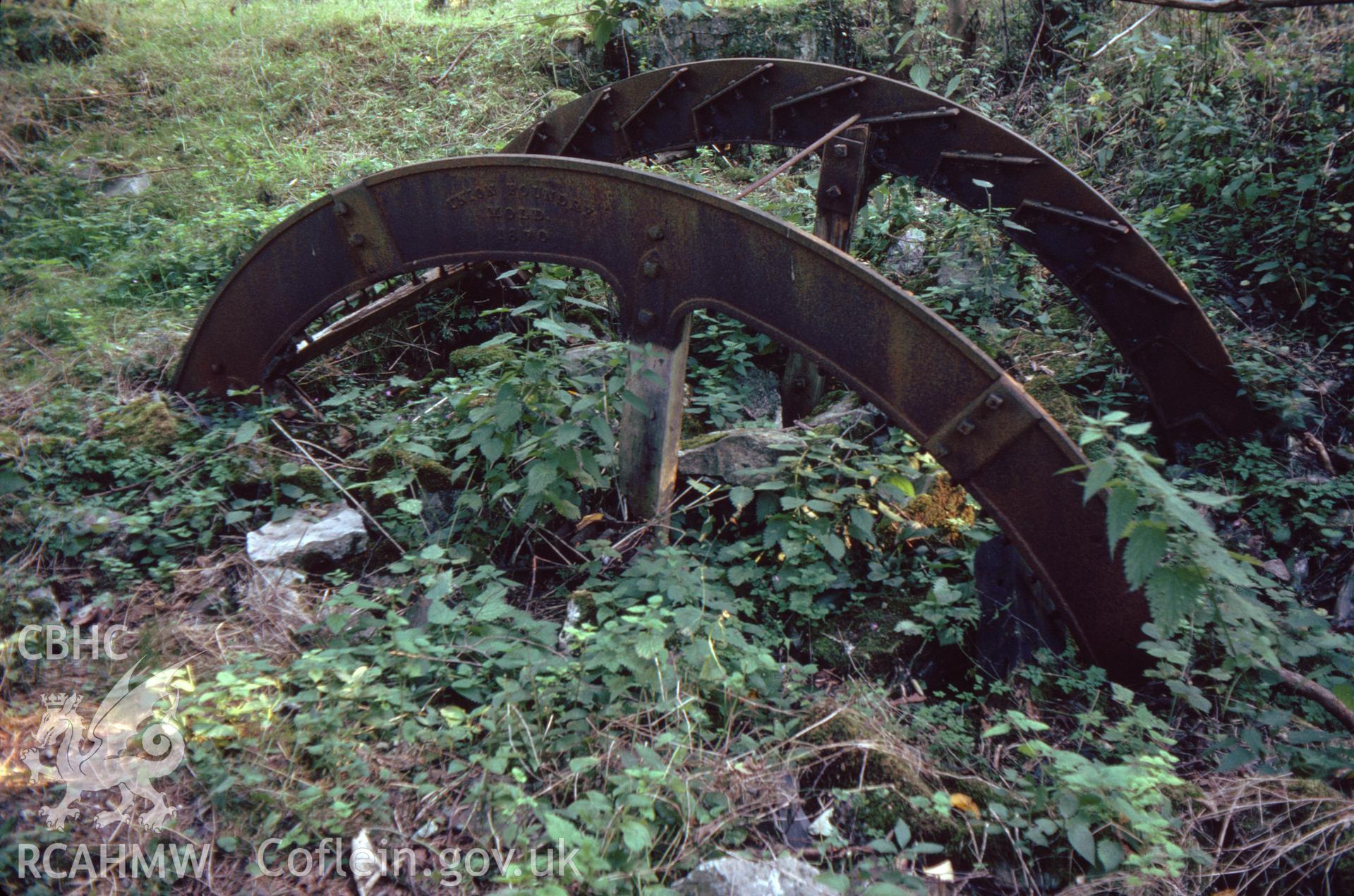 Digitized 35mm slide showing small water wheel at Maeshafn.