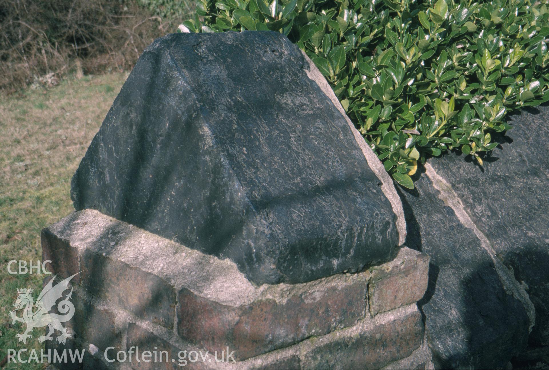 Colour slide of All Saints, Kilvey Road, Swansea: showing a triangular cast copper-slag block in the churchyard wall.