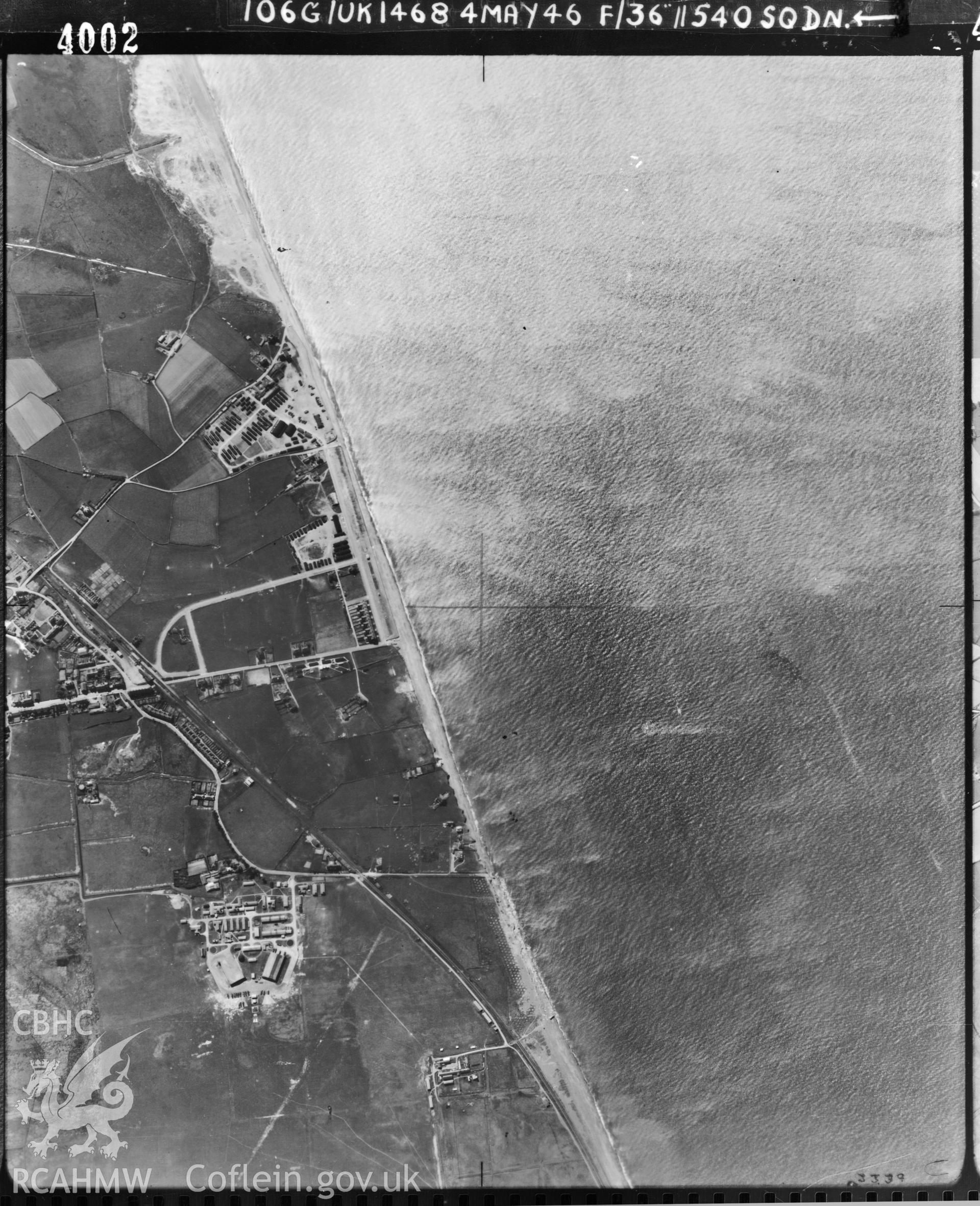 Black and white vertical aerial photograph taken by the RAF on 04/05/1946 centred on SH57540049 at a scale of 1:10000. The photograph includes part of Tywyn community in Gwynedd.