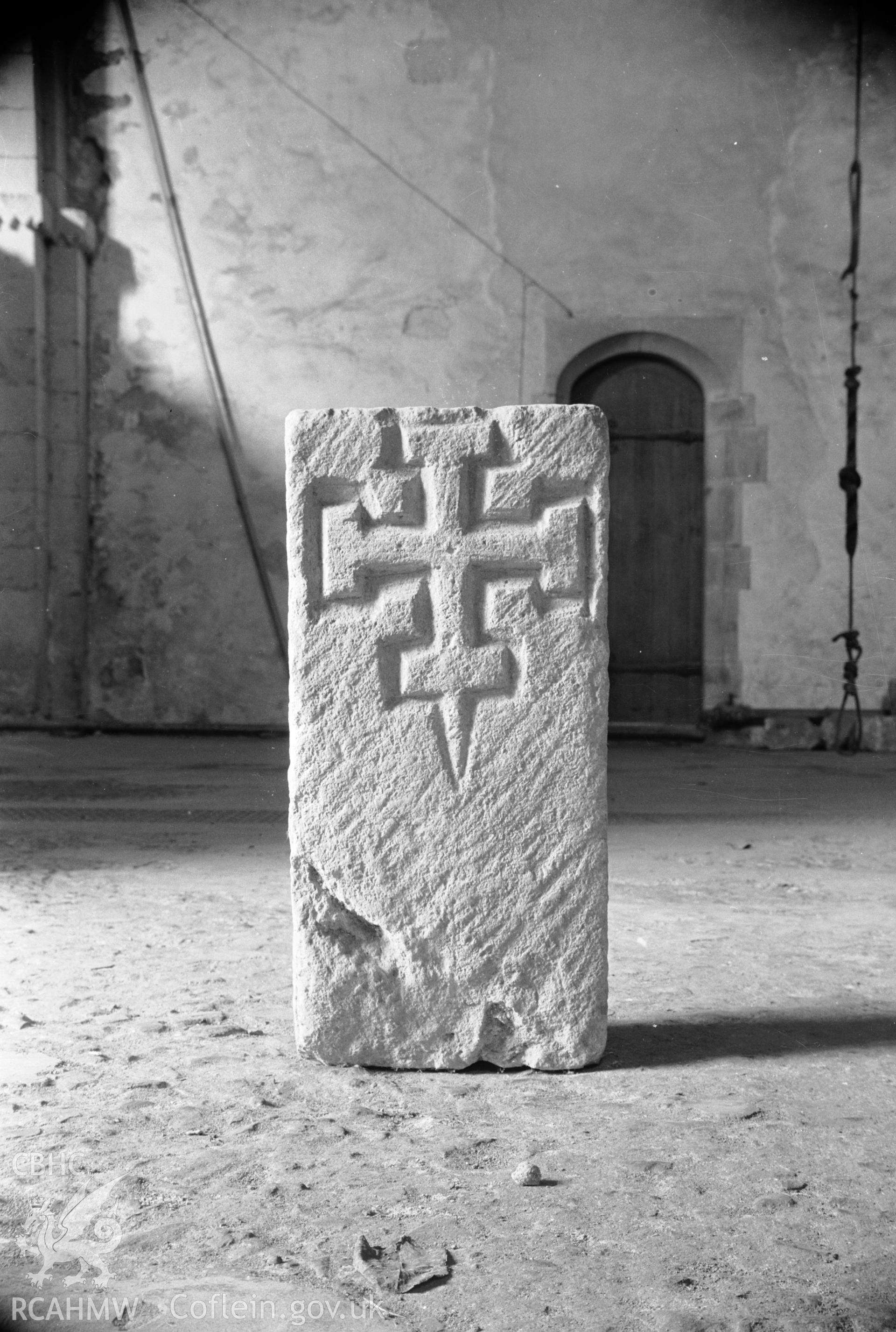 D.O.E photograph of Ewenny Priory - headstone, early 12th century.