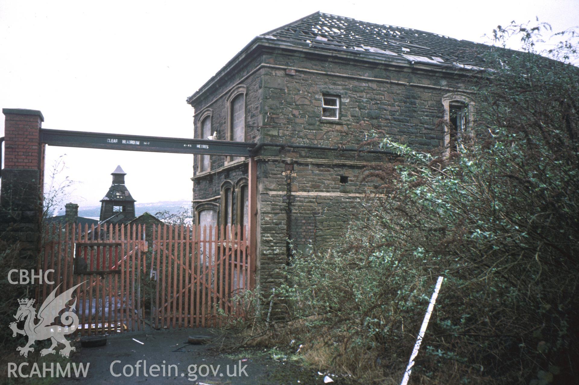 Colour slide of Hafod Copperworks, Swansea: showing the works wall, copper-slag coping, and south arch.