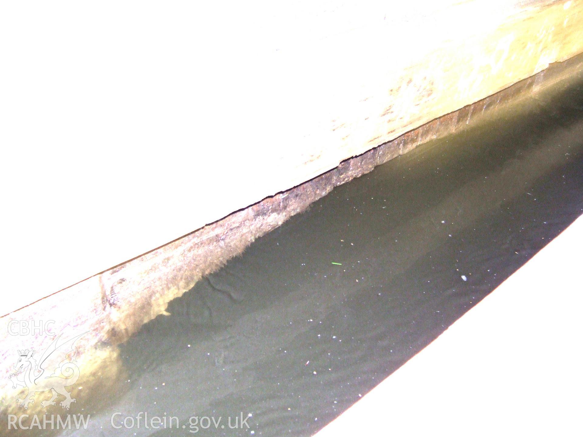 Fairly clear view of submersed arch supporting the tunnel towing-path taken from a passing boat.