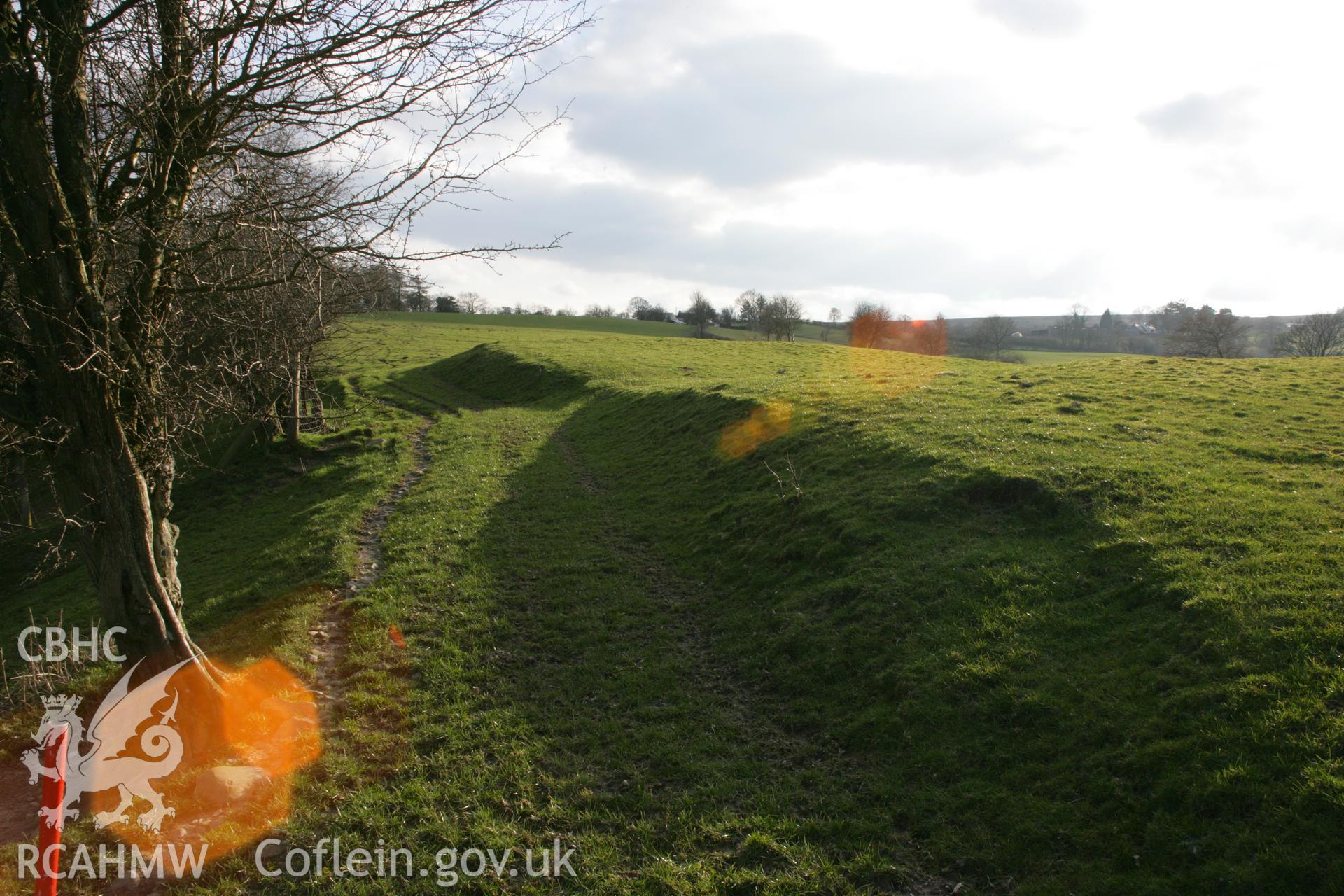 View of eastern terminals of main ramparts, with farm track, view looking south.