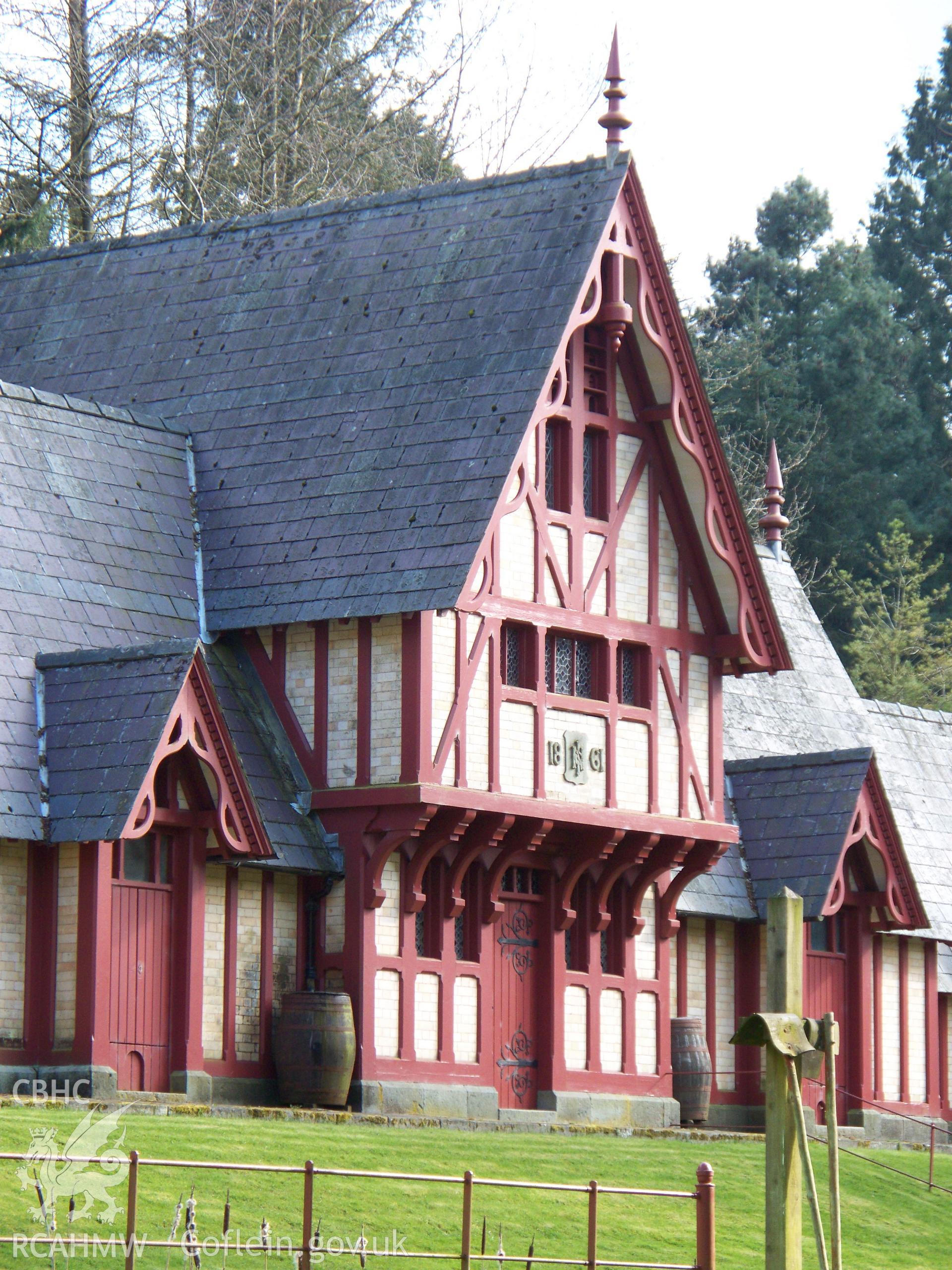 North-west central gable showing date plaque & bargeboards.