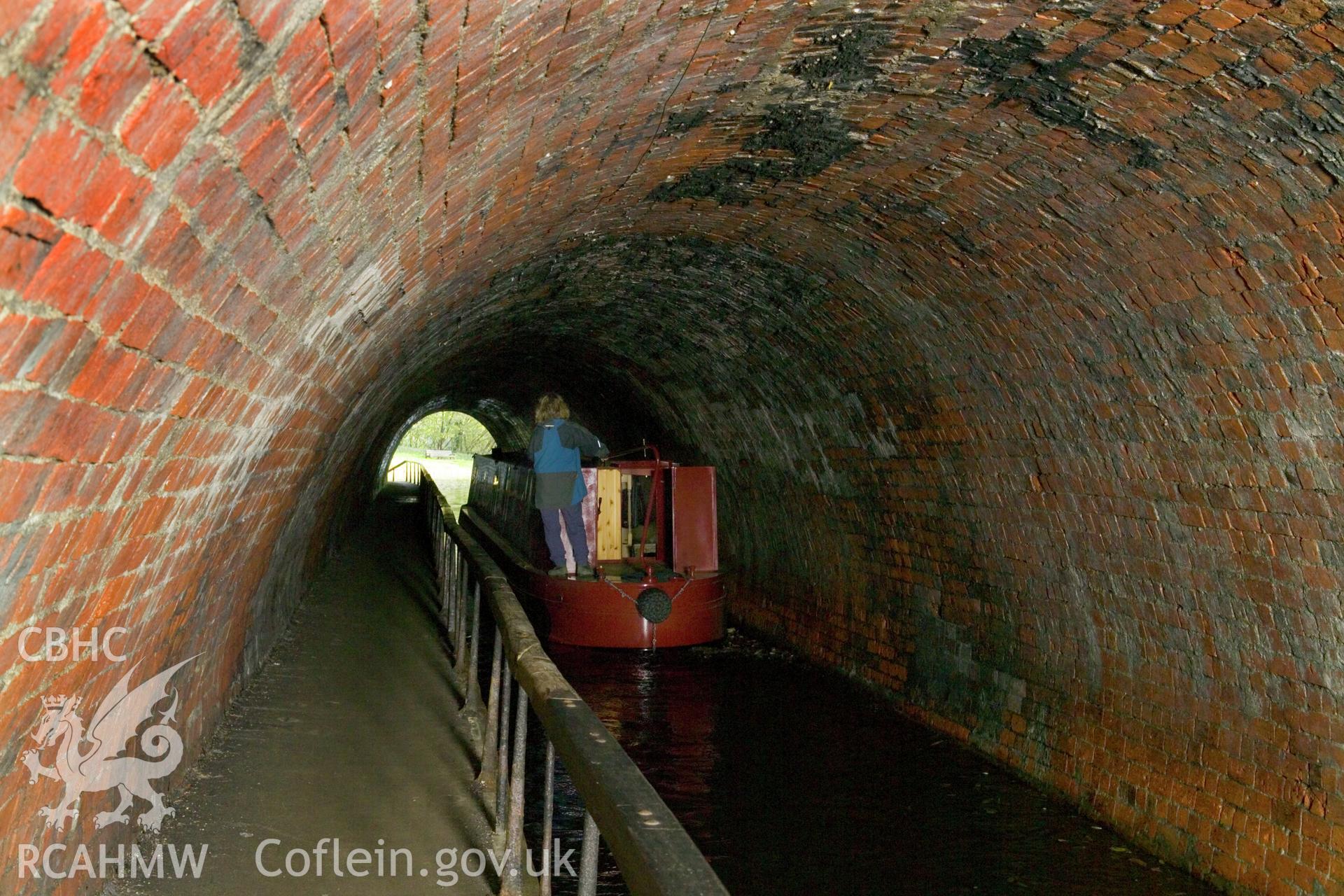 Interior, canal boat approaching south portal, distant view.